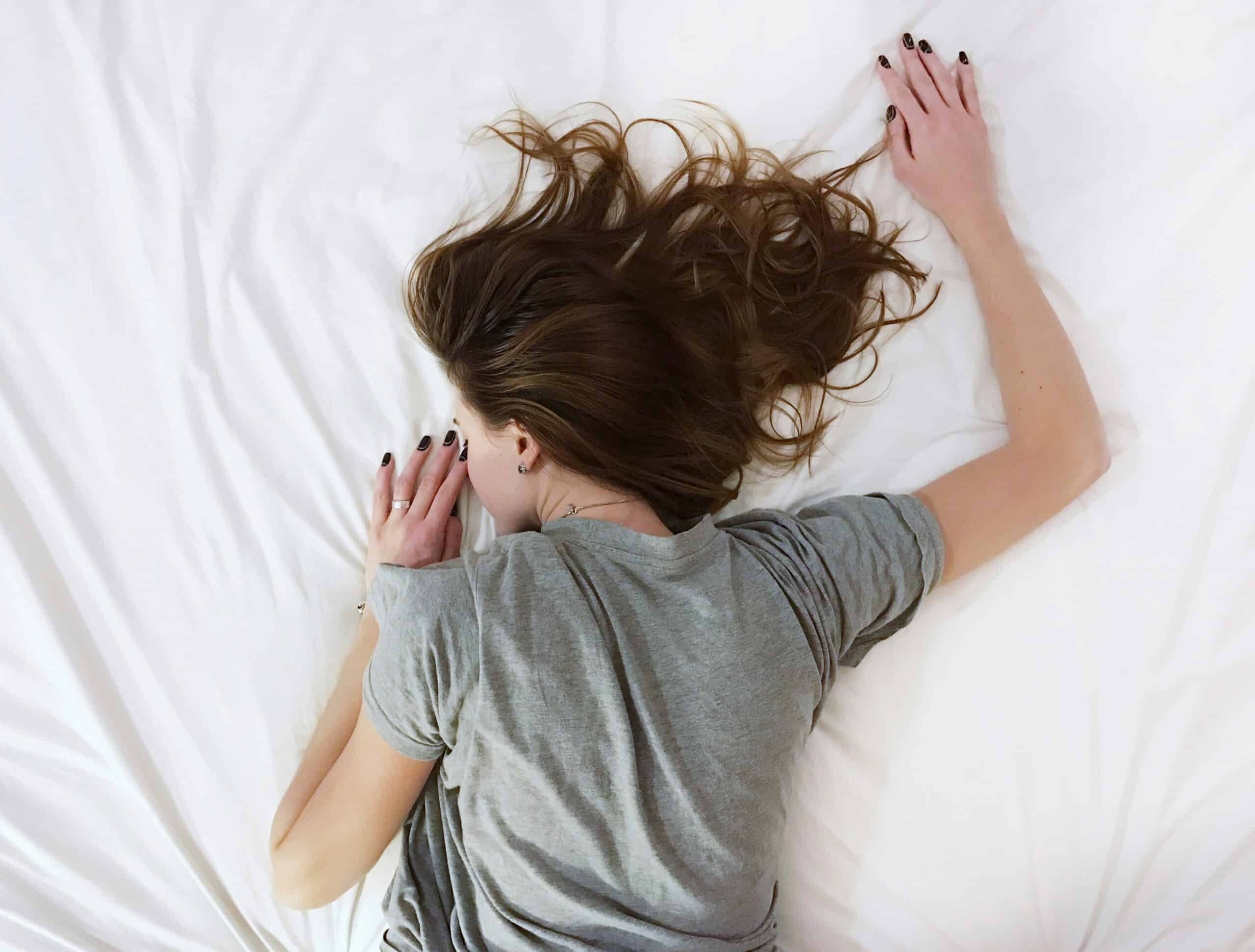 a woman resting in bed