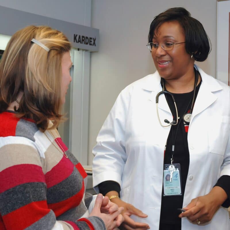 a doctor talking to a patient