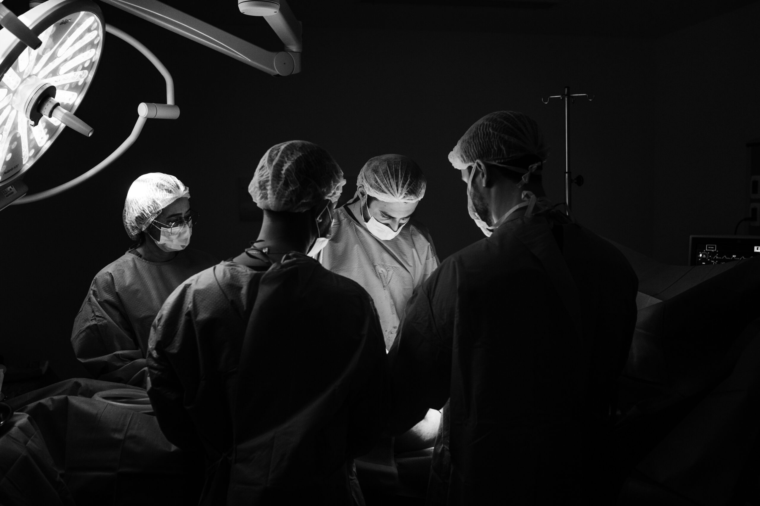 doctors performing surgery