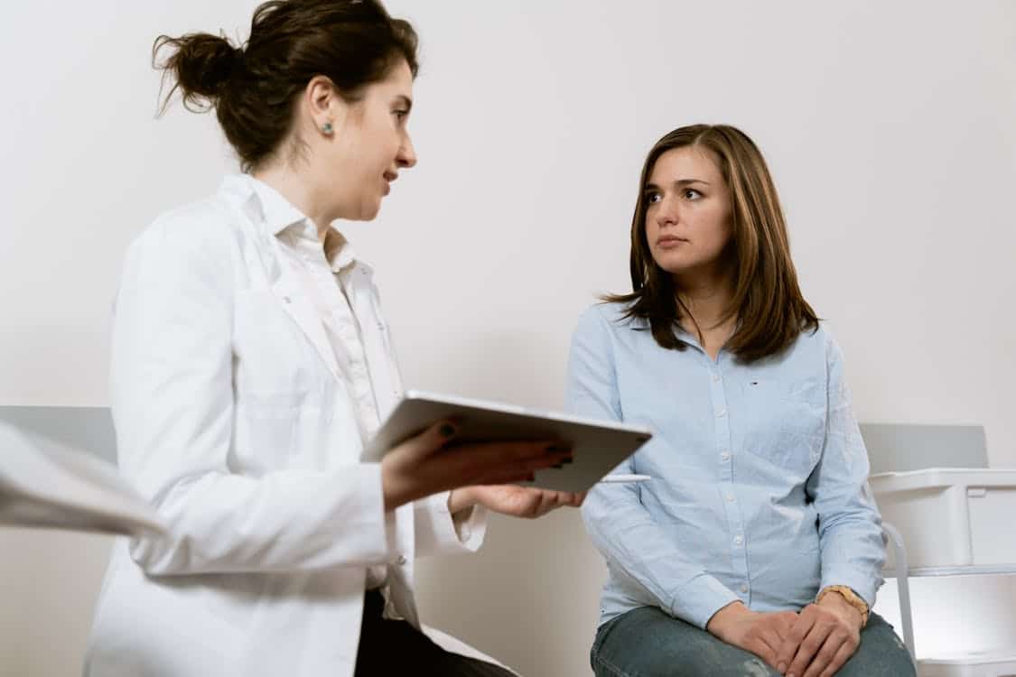 pexels photo 7089401jpeg - Rachael Haverland Site female doctor with female patient