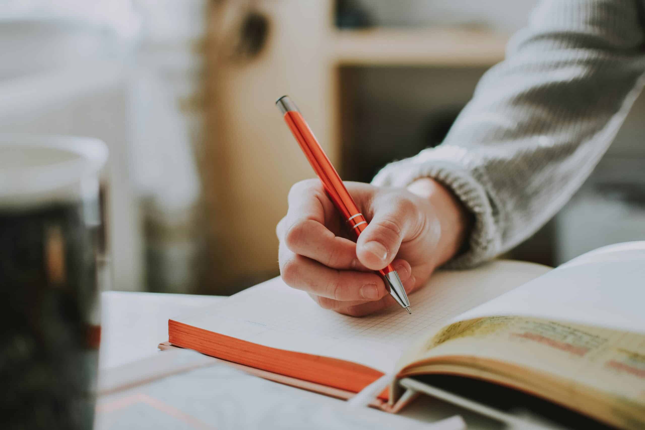 a person journaling - Rachael Haverland Site a person journaling