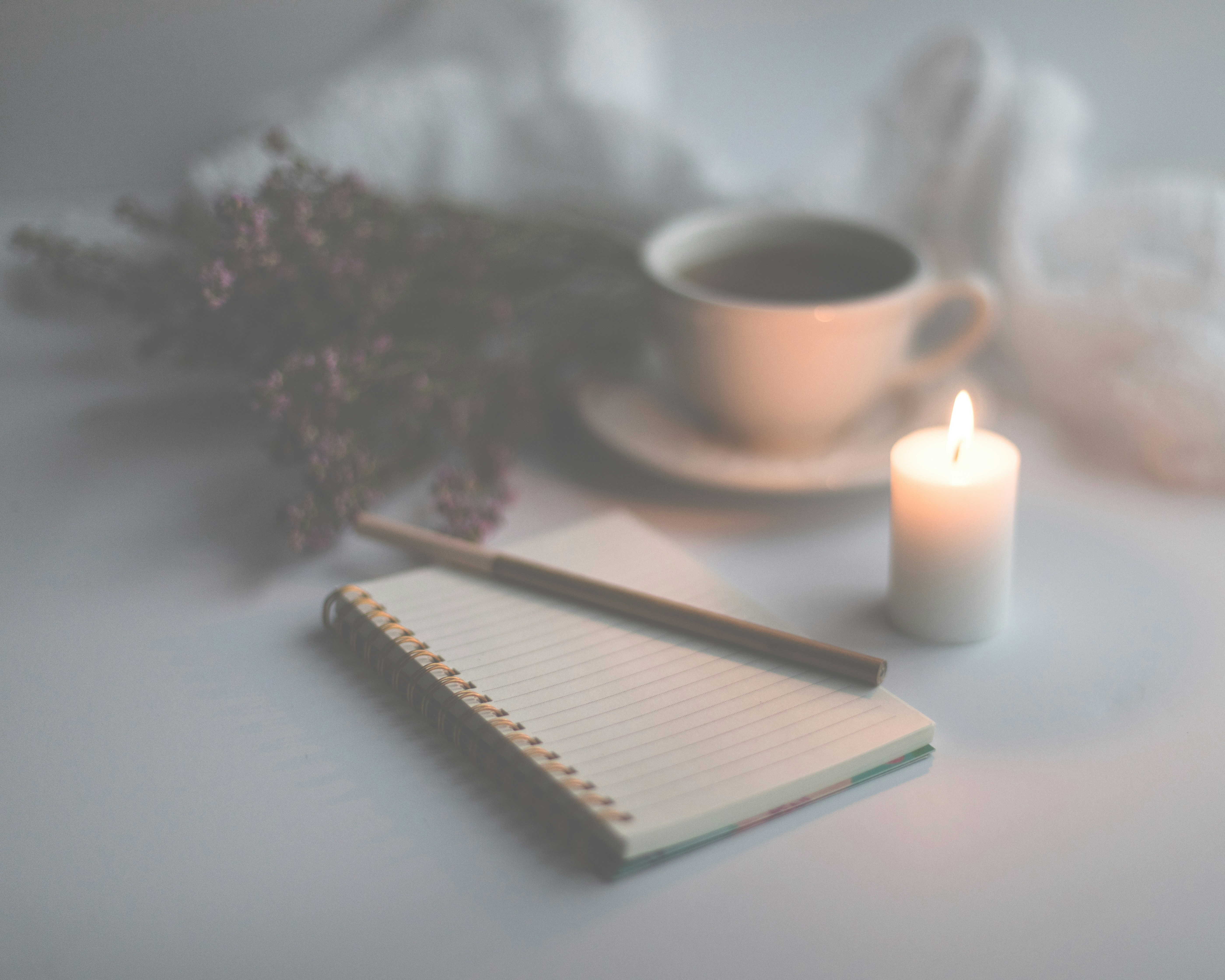 a notepad with a candle and pen - Rachael Haverland Site a notepad with a candle and pen