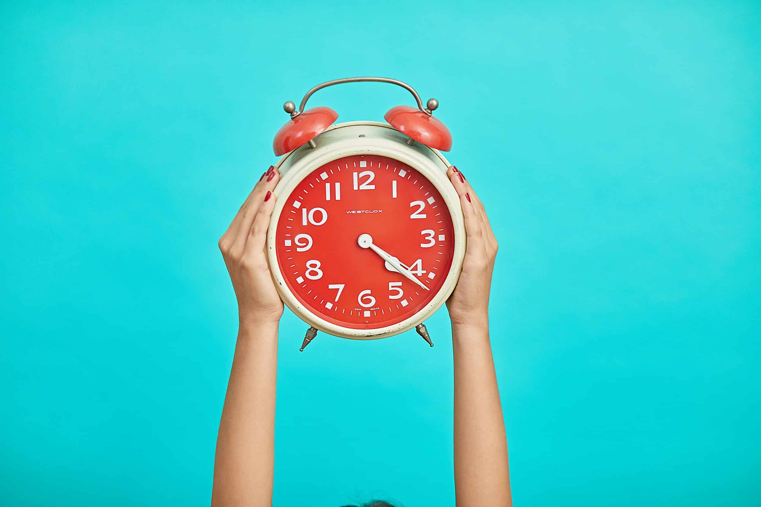 a person holding a clock - Rachael Haverland Site a person holding a clock