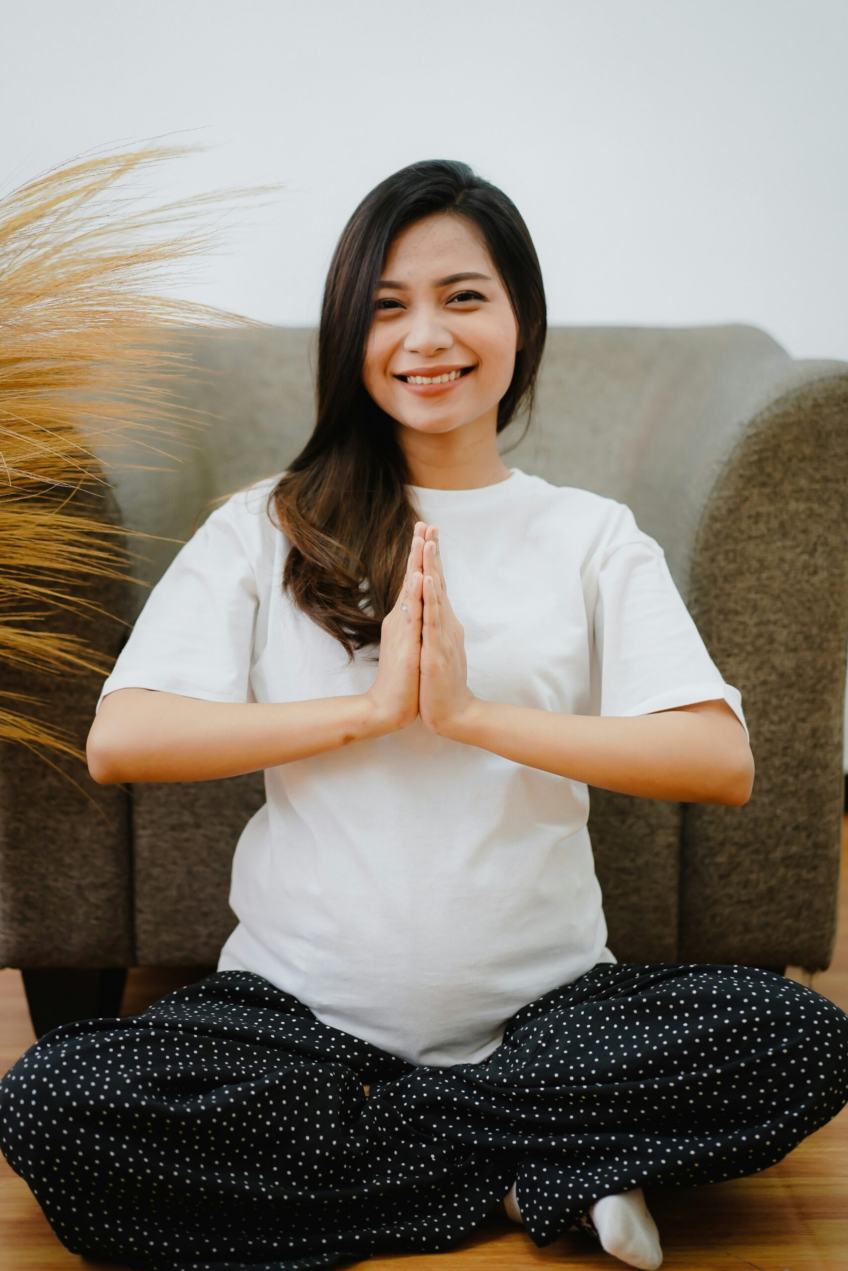 a pregnant woman doing yoga - Rachael Haverland Site a pregnant woman doing yoga