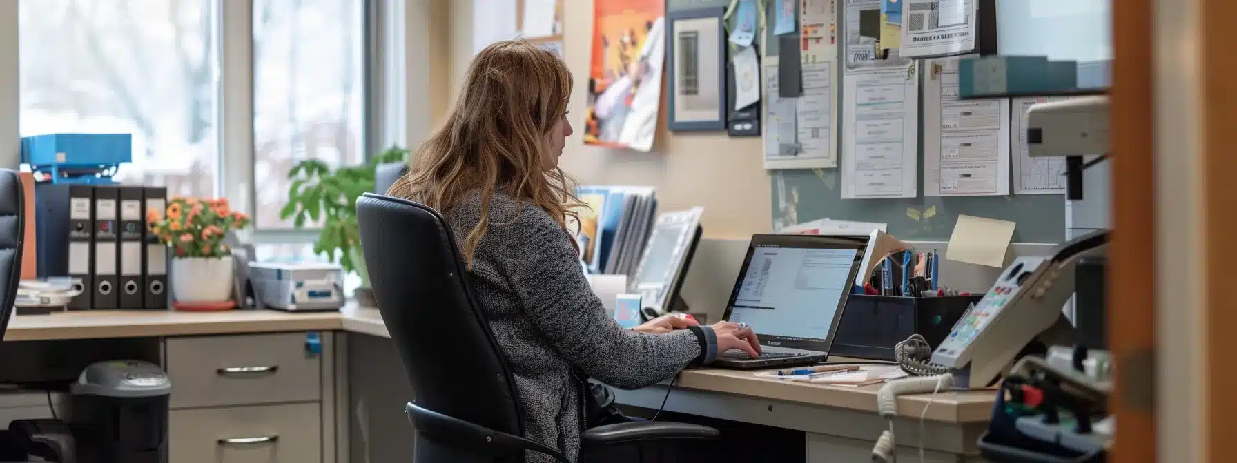 a focused office scene captures a determined woman seated at a desk, surrounded by medical charts and a laptop, as she engages in a video call with a healthcare provider, symbolizing the proactive management of endometriosis and the importance of support in professional life. - Rachael Haverland Site a focused office scene captures a determined woman seated at a desk, surrounded by medical charts and a laptop, as she engages in a video call with a healthcare provider, symbolizing the proactive management of endometriosis and the importance of support in professional life.