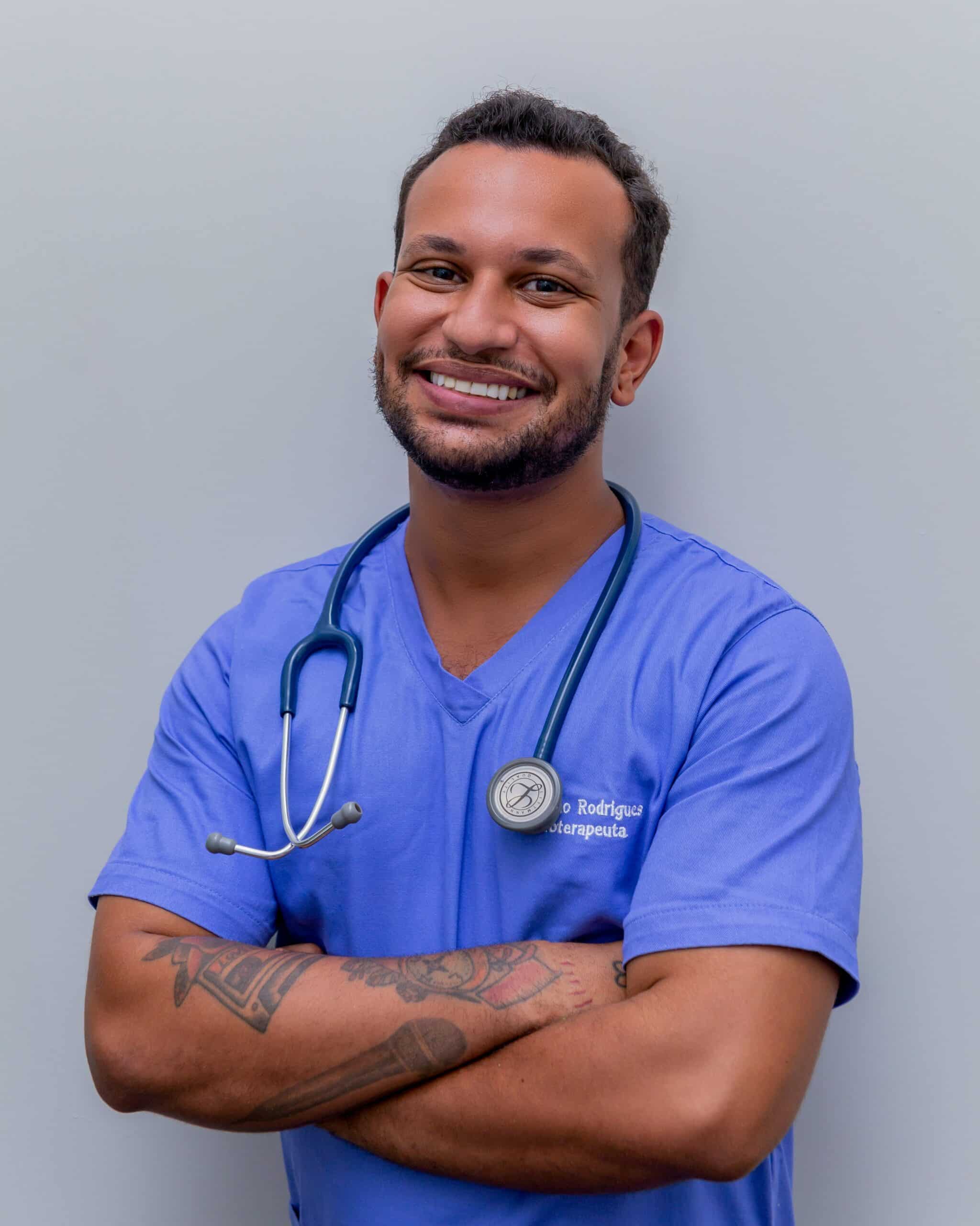 Smiling healthcare provider in scrubs with a stethoscope, symbolizing supportive care through alternative and complementary therapies for infertility. - Rachael Haverland Site Smiling healthcare provider in scrubs with a stethoscope, symbolizing supportive care through alternative and complementary therapies for infertility.