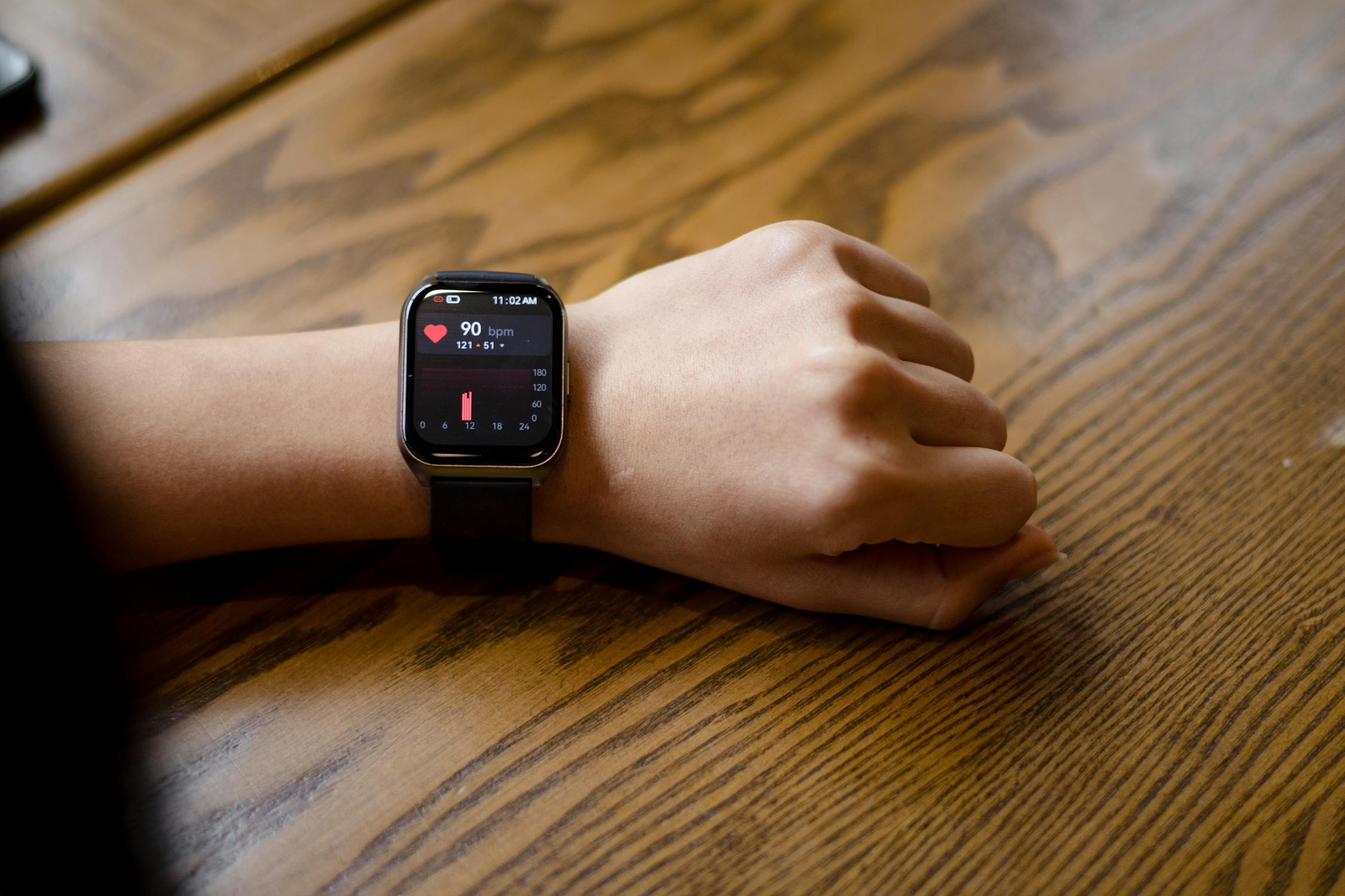 free photo of close up of a person looking at the pulse displayed on a smartwatchjpeg - Rachael Haverland Site digital health monitoring wearable device