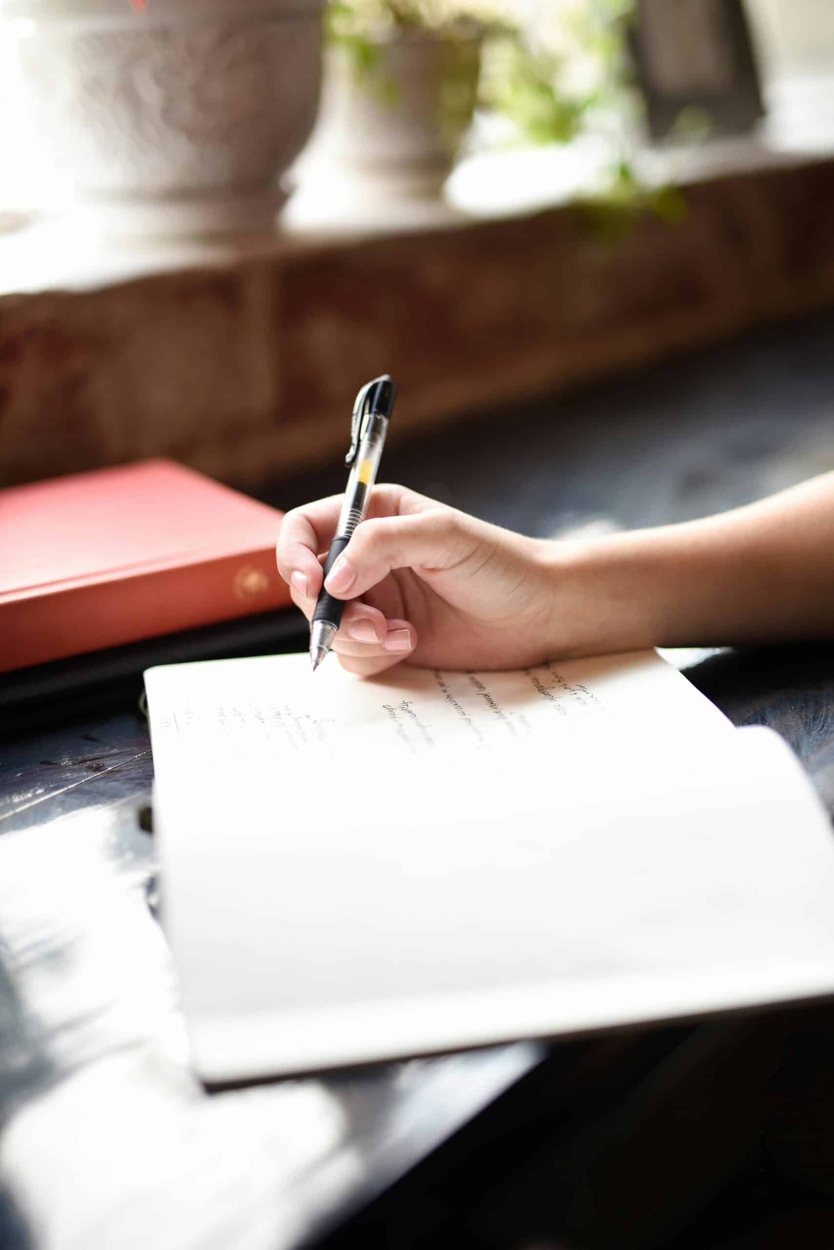 a woman journaling - Rachael Haverland Site a woman journaling