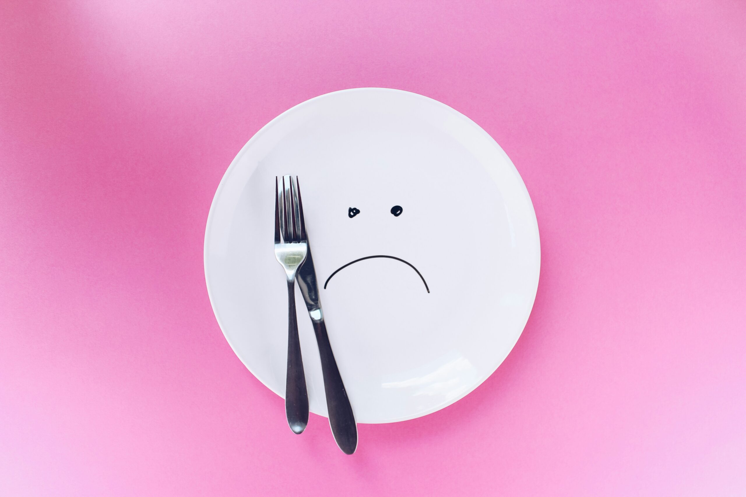 a sad face drawn on a plate with a fork and knife - Rachael Haverland Site a sad face drawn on a plate with a fork and knife