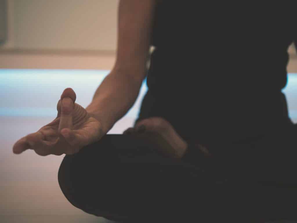 woman sitting in a yoga pose