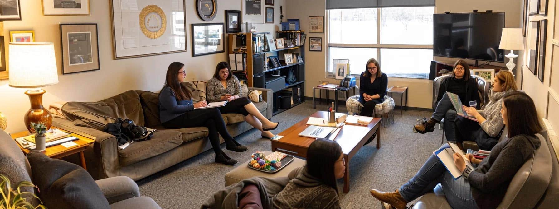a cozy, well-lit office space features a diverse group of individuals engaged in a collaborative discussion about lifestyle adjustments and support strategies for managing endometriosis, emphasizing camaraderie and empowerment. - Rachael Haverland Site a cozy, well-lit office space features a diverse group of individuals engaged in a collaborative discussion about lifestyle adjustments and support strategies for managing endometriosis, emphasizing camaraderie and empowerment.