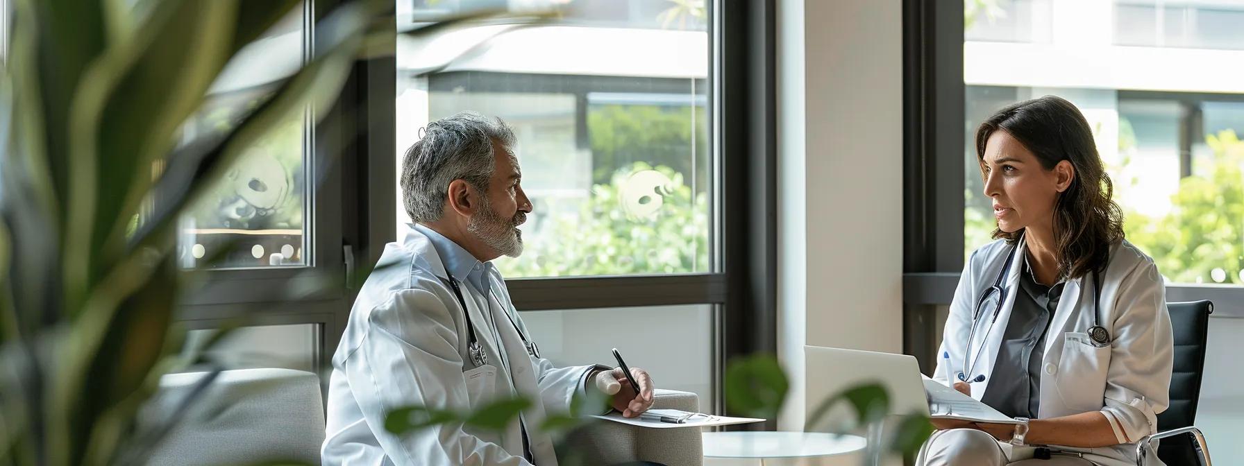 a focused consultation scene in a modern medical office - Rachael Haverland Site a focused consultation scene in a modern medical office