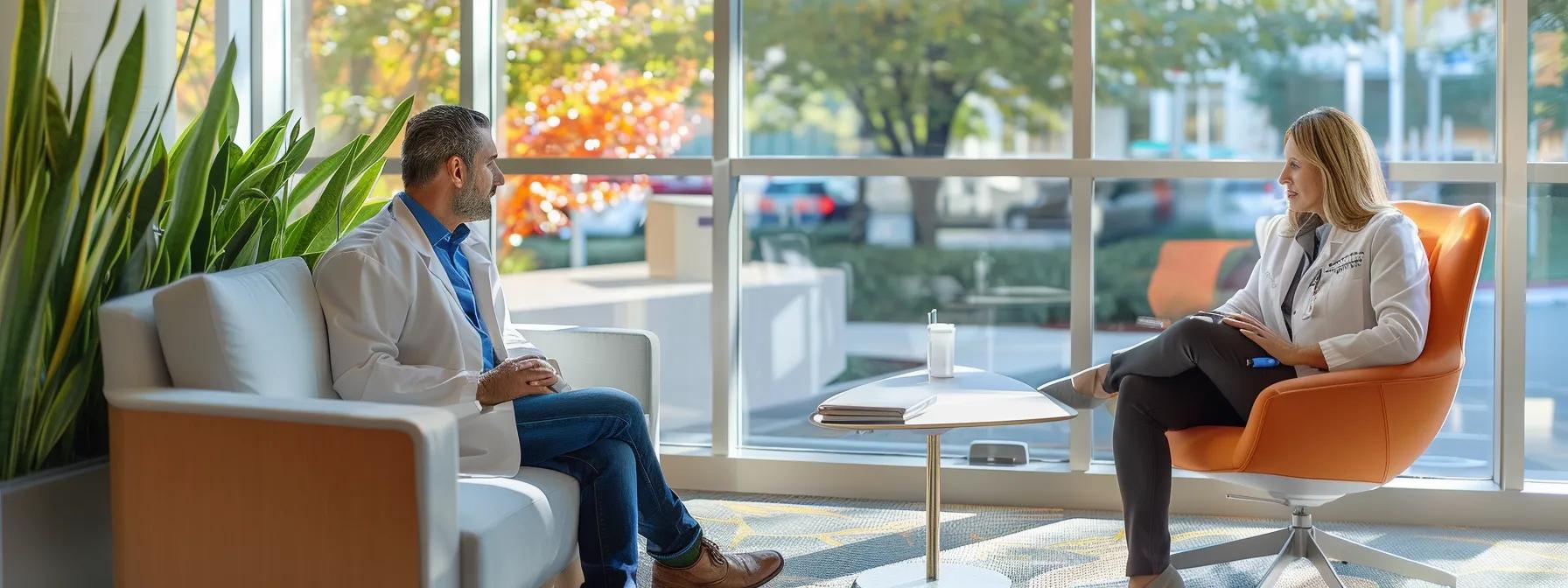 a focused healthcare consultation takes place in a modern medical office - Rachael Haverland Site a focused healthcare consultation takes place in a modern medical office