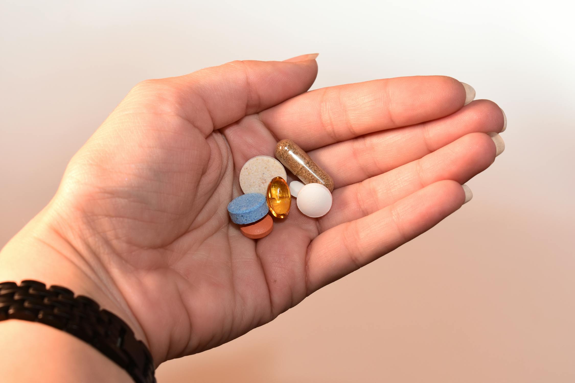 pexels photo 1424538jpeg - Rachael Haverland Site different types of medicine in woman's hand