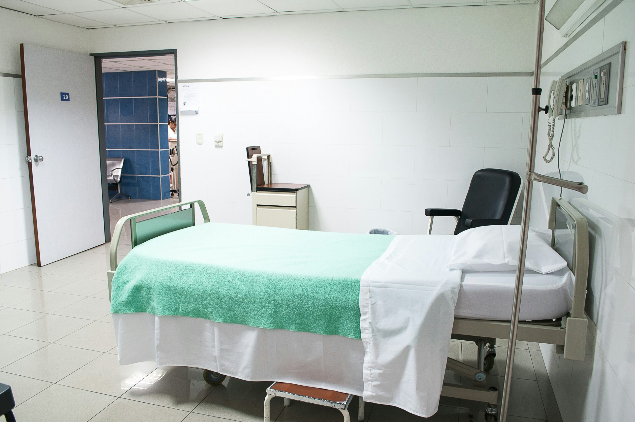 Empty hospital room with bed and medical equipment - Rachael Haverland Site Empty hospital room with bed and medical equipment