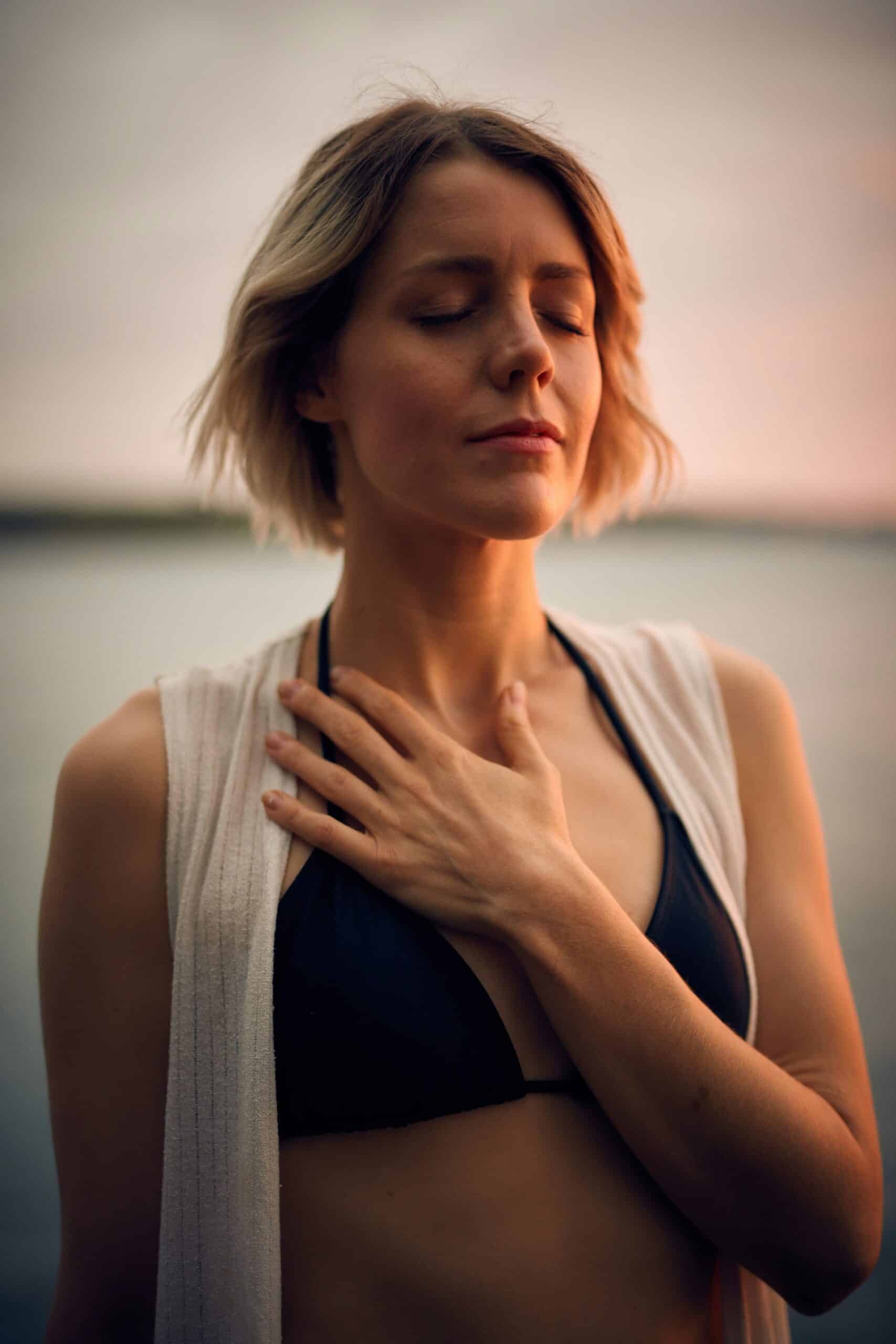 a woman with hand on her chest - Rachael Haverland Site a woman with hand on her chest