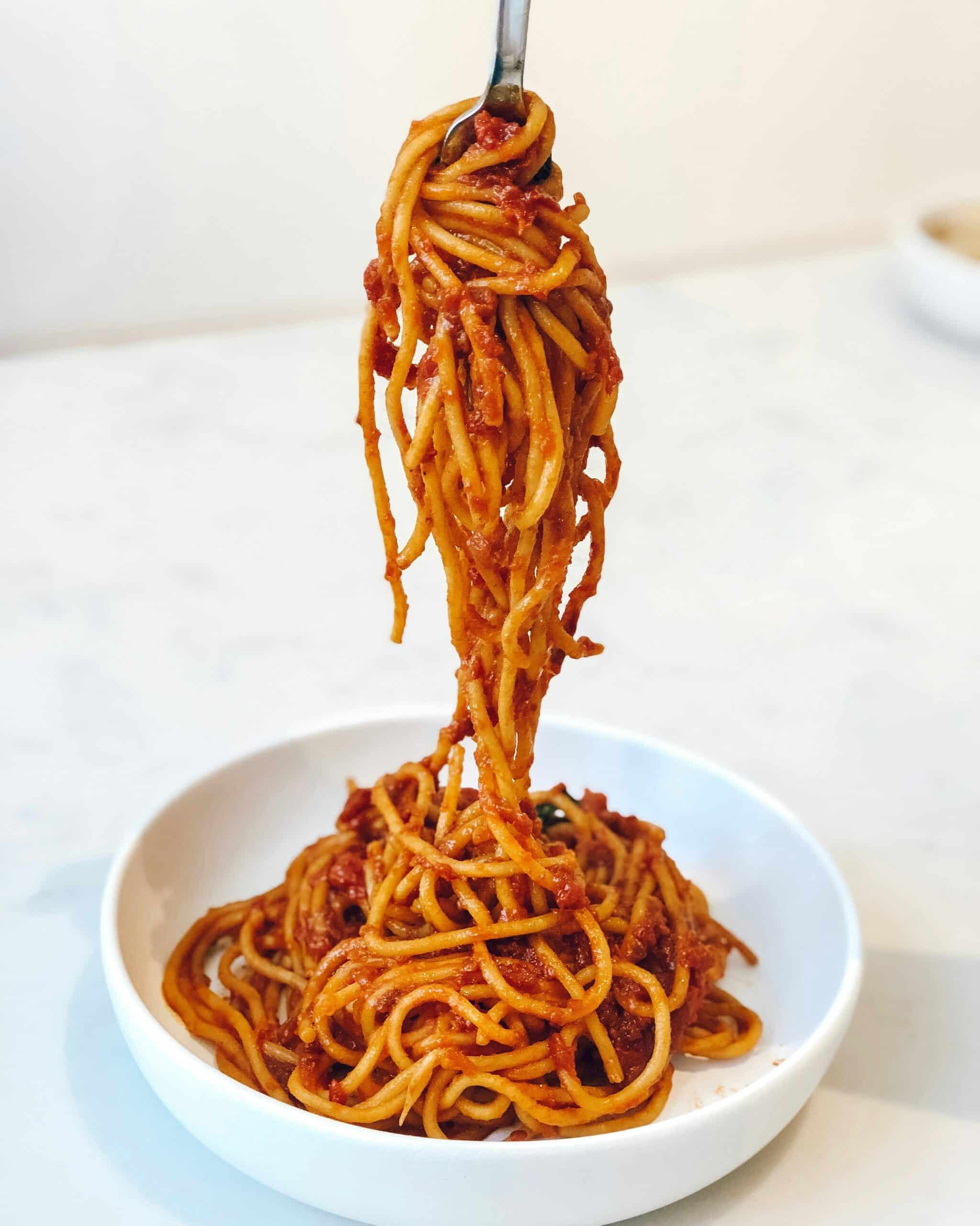 A fork twirling wheat-based spaghetti highlights a common gluten-containing food to avoid for endometriosis symptom management. - Rachael Haverland Site A fork twirling wheat-based spaghetti highlights a common gluten-containing food to avoid for endometriosis symptom management.