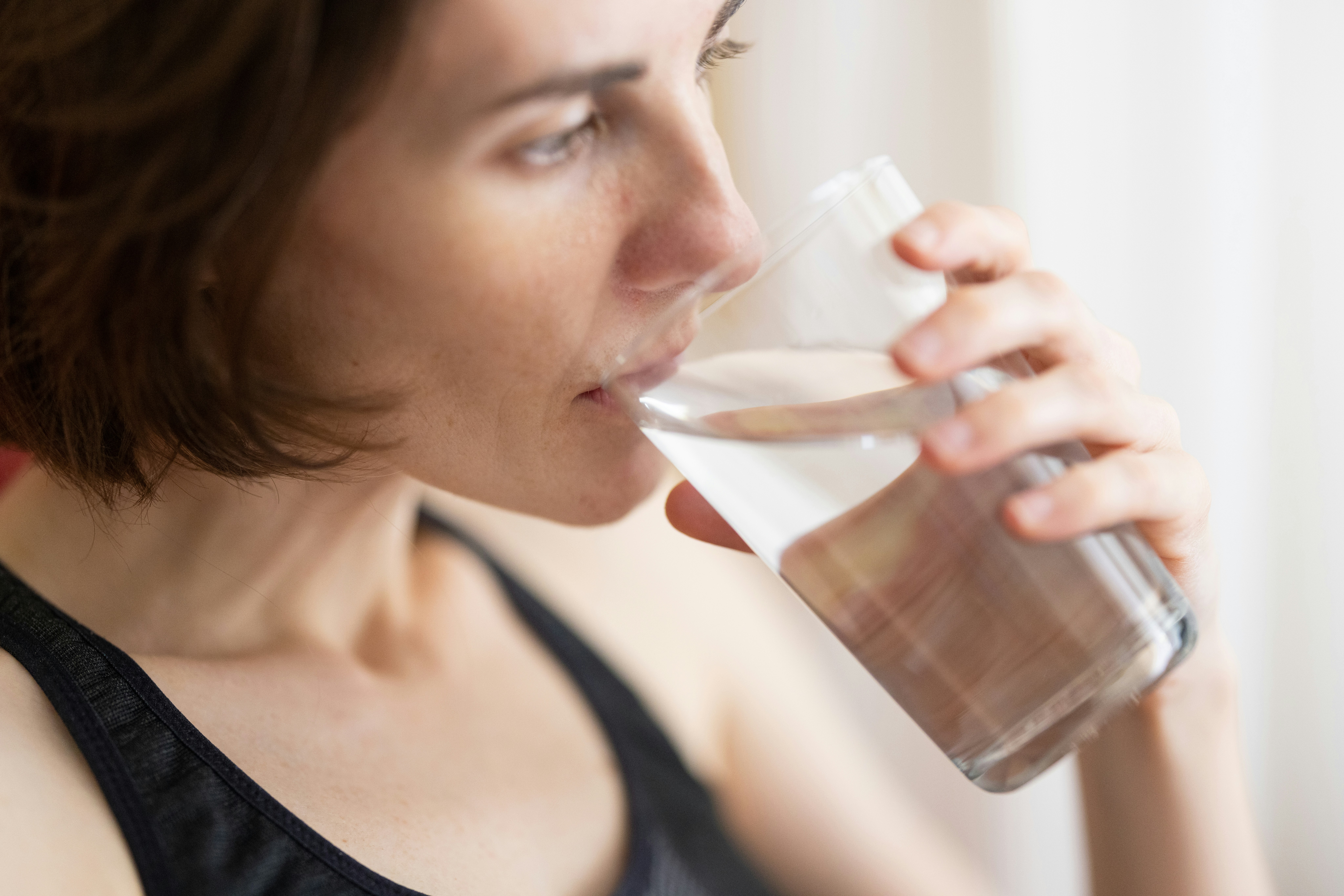 woman drinking water - Rachael Haverland Site woman drinking water