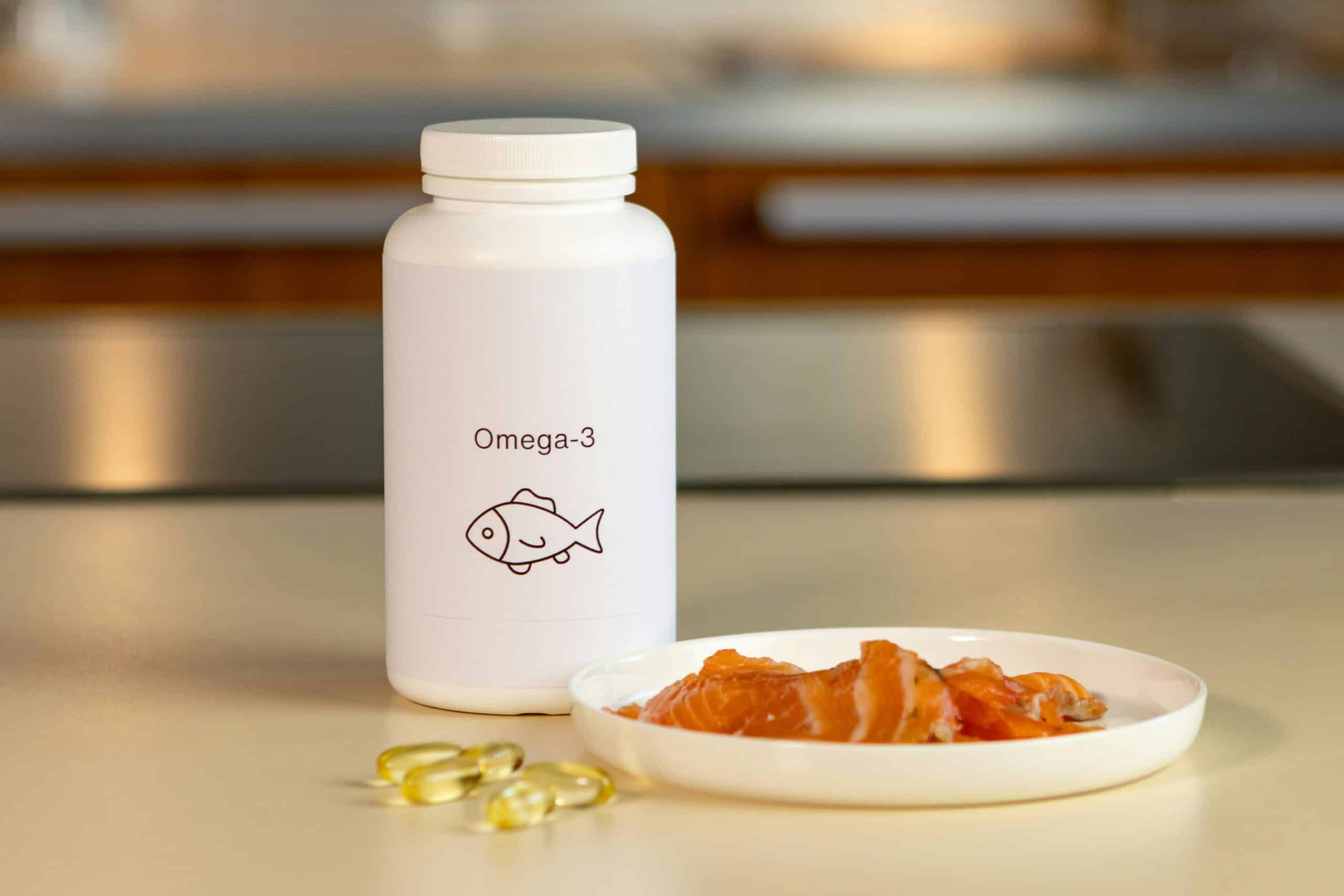 A bottle labeled Omega-3 sits beside fish oil capsules and fresh salmon, highlighting dietary sources that may support endometriosis relief. - Rachael Haverland Site A bottle labeled Omega-3 sits beside fish oil capsules and fresh salmon, highlighting dietary sources that may support endometriosis relief.