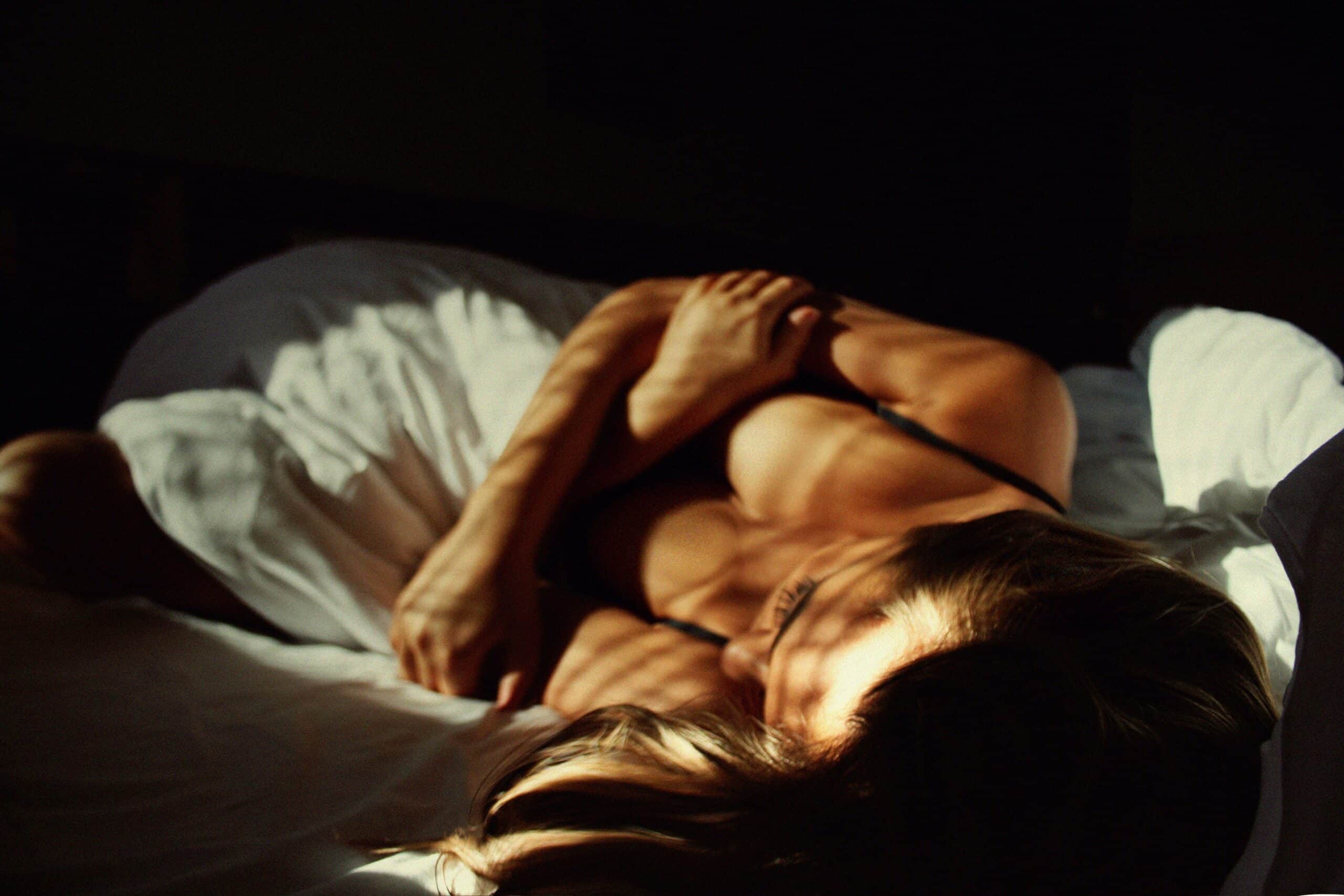 A woman resting in bed
