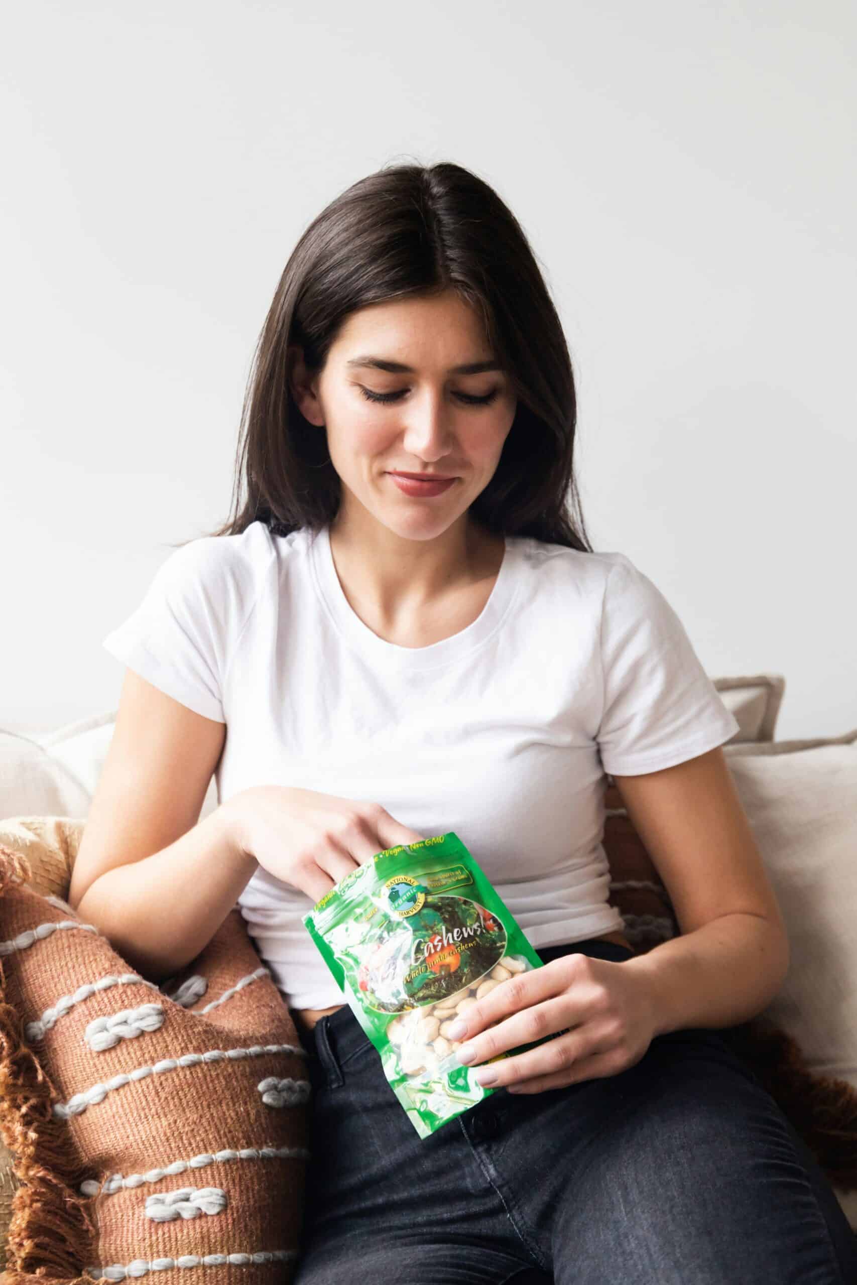 a woman eating from a bag of chips - Rachael Haverland Site a woman eating from a bag of chips
