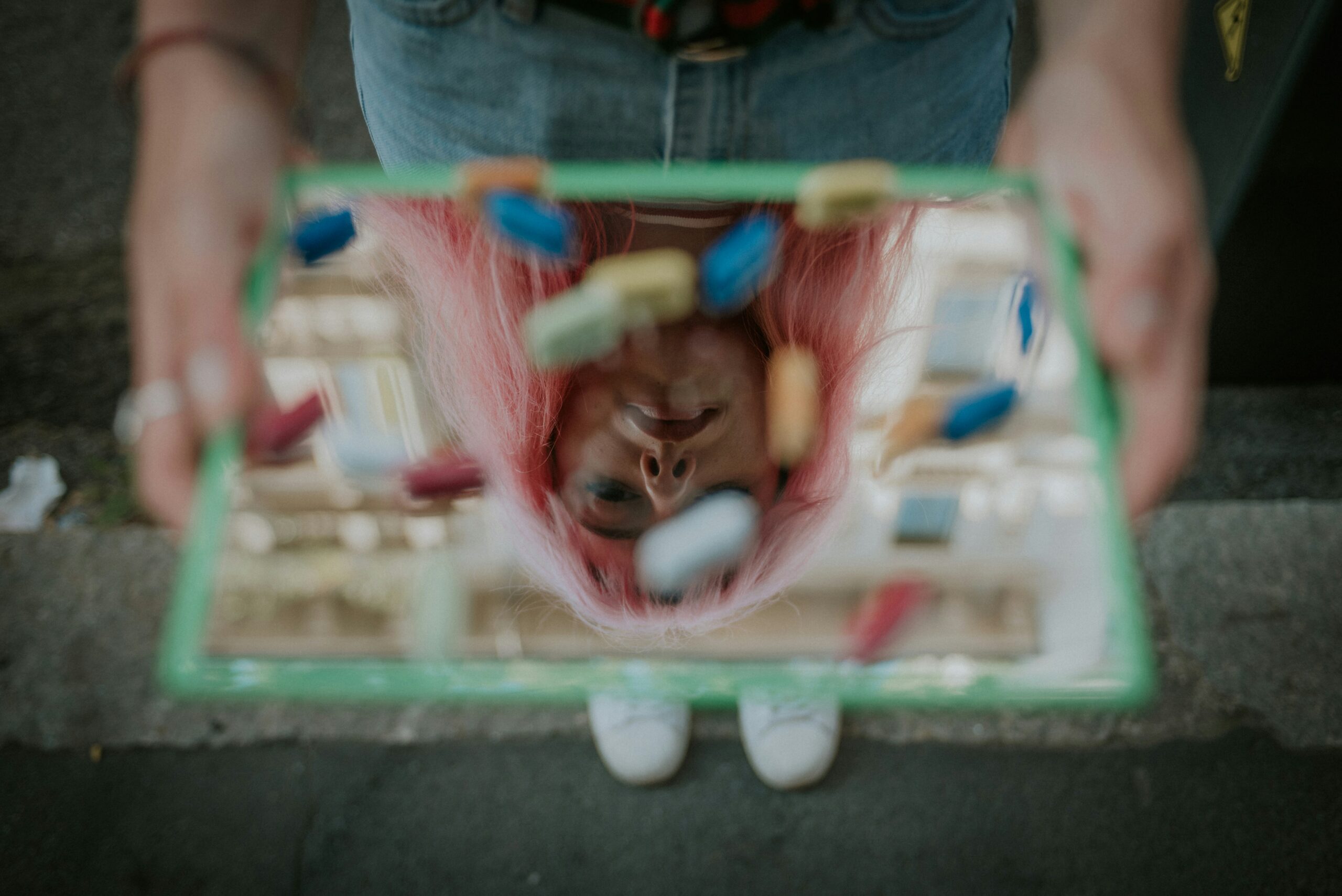 a woman holding pills - Rachael Haverland Site a woman holding pills