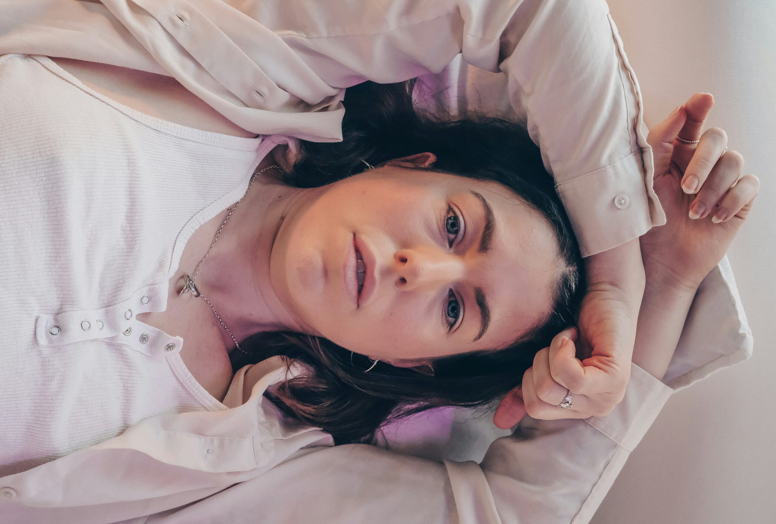 a woman laying down with cramps - Rachael Haverland Site a woman laying down with cramps