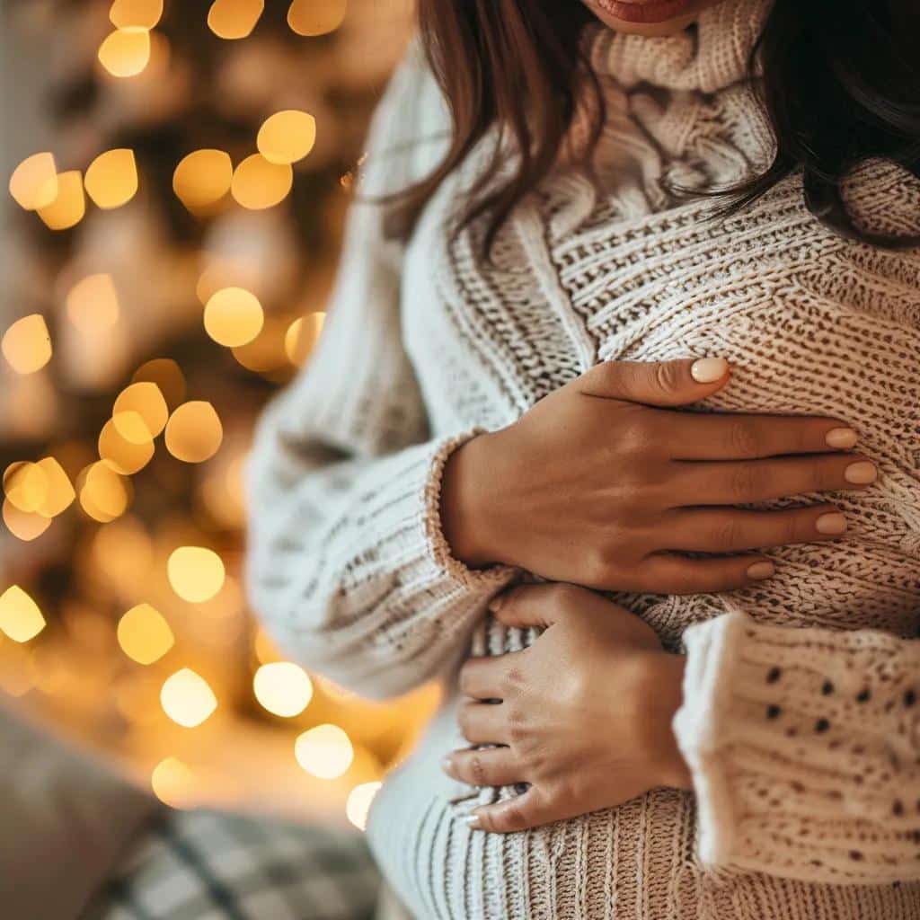 A woman experiencing discomfort in her abdomen, illustrating the common symptoms of endometriosis that can impact fertility.
