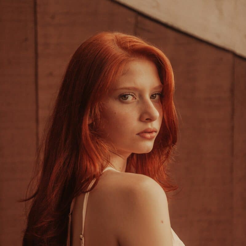 a woman looking at the camera