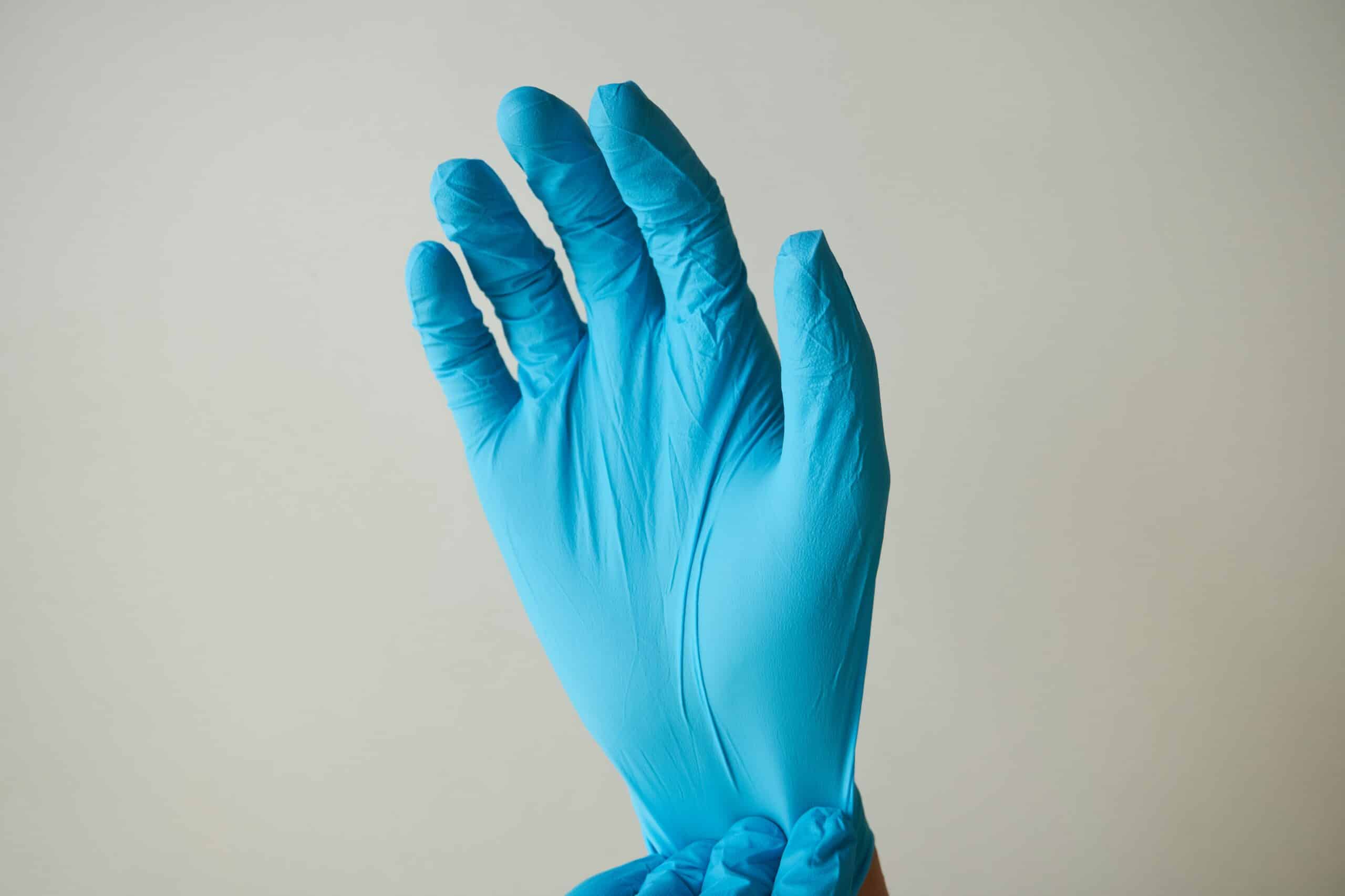 a person wearing a glove