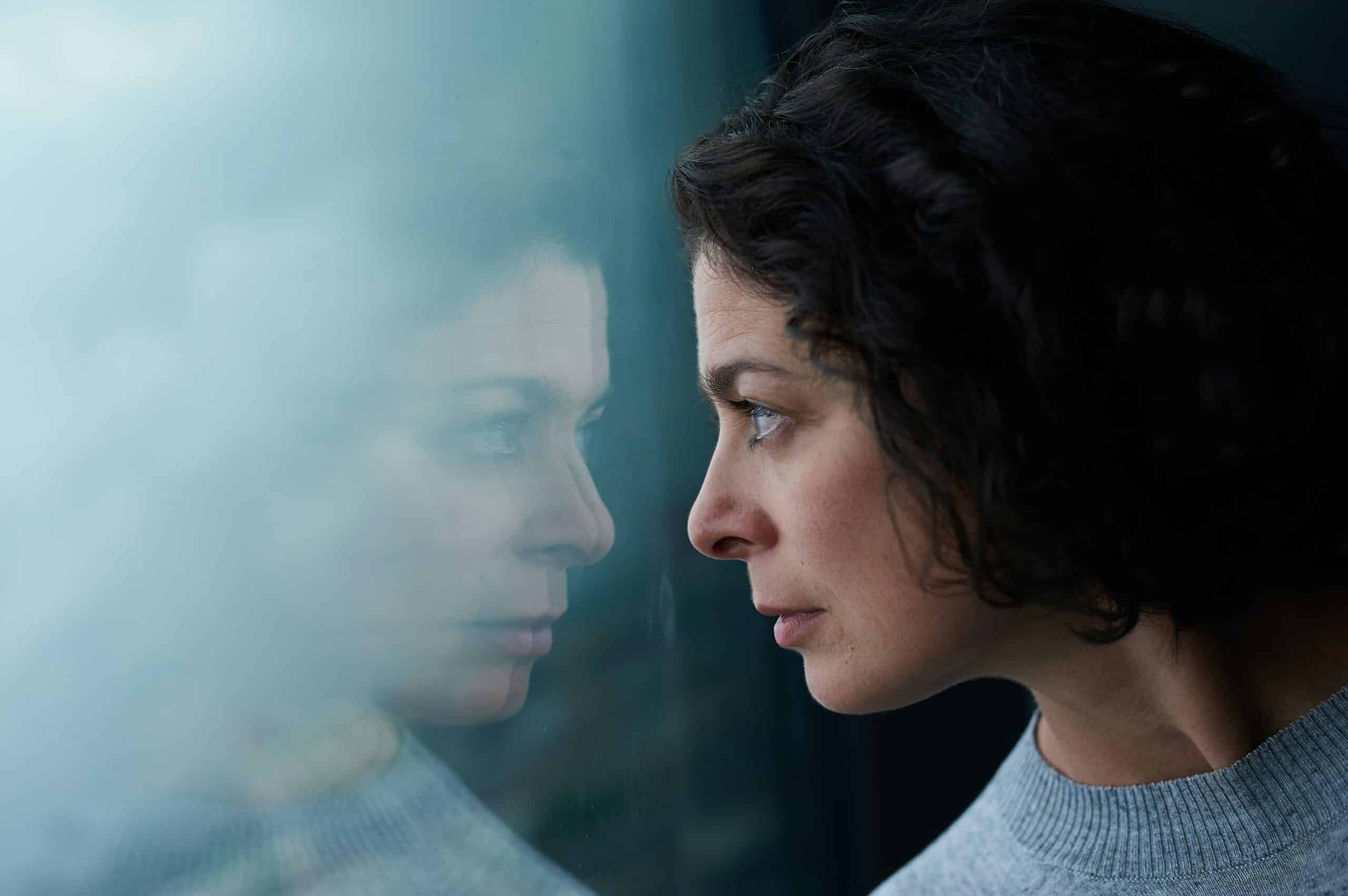 a woman tensed and worried