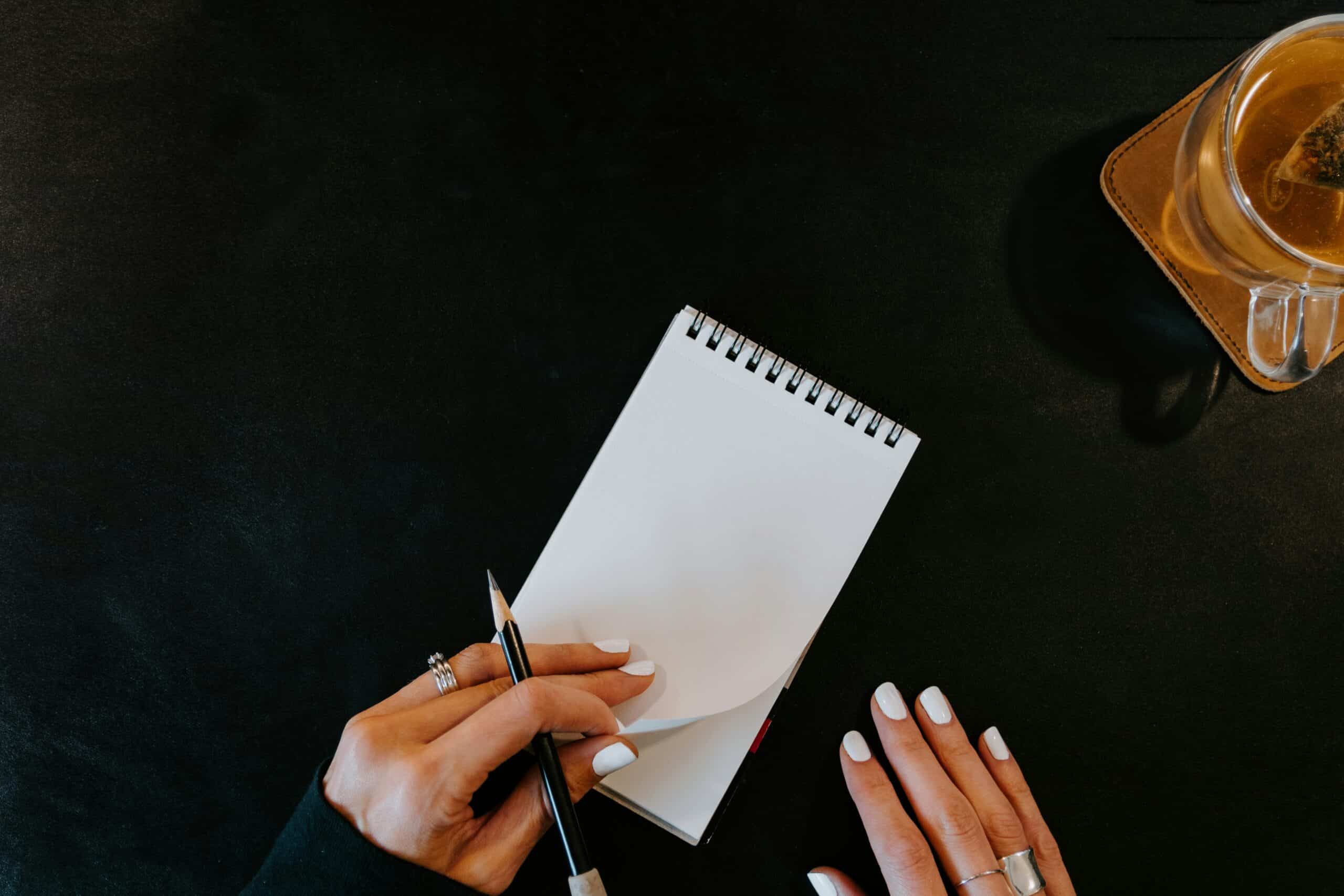a woman taking notes
