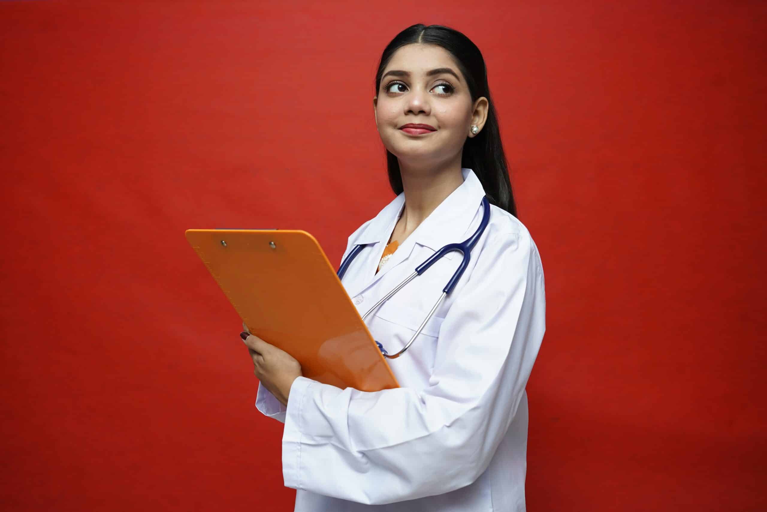 a doctor holding a writing board