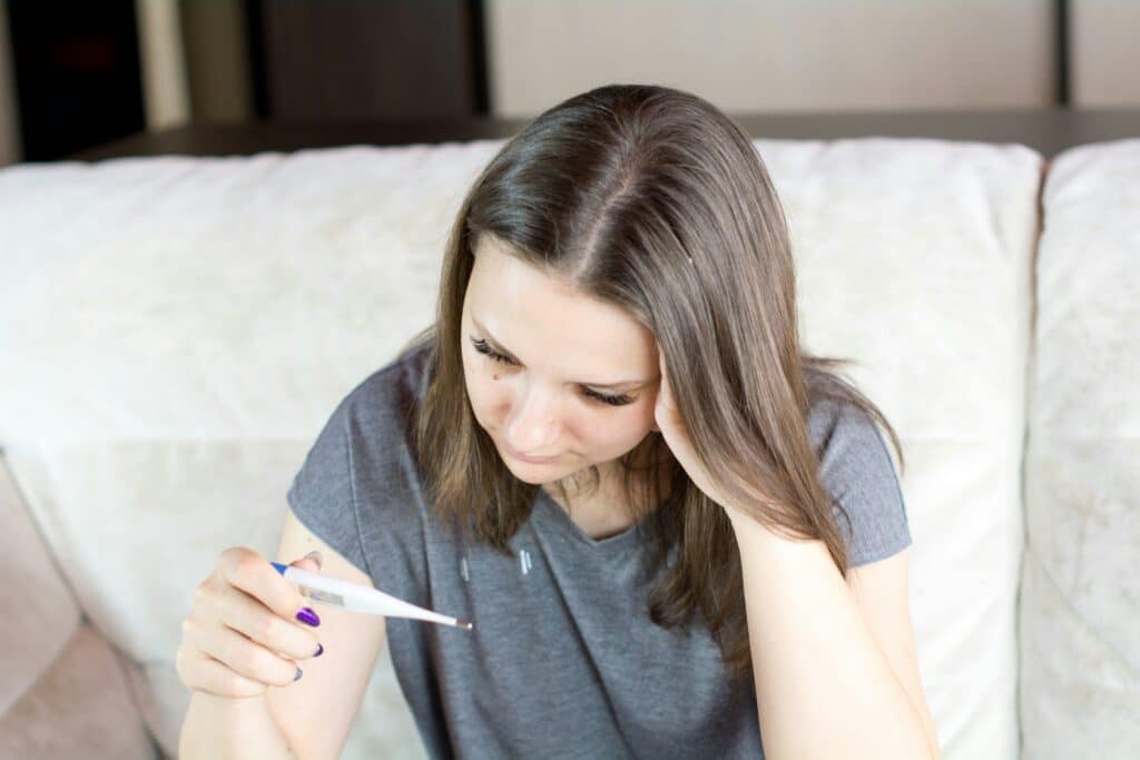 woman checking symptoms