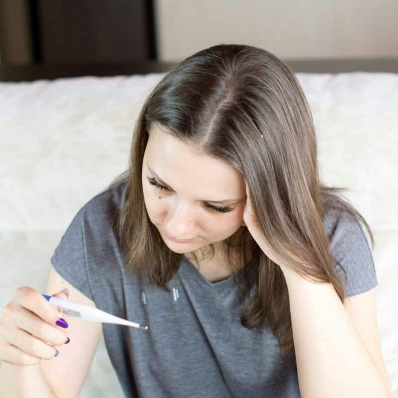 woman checking symptoms