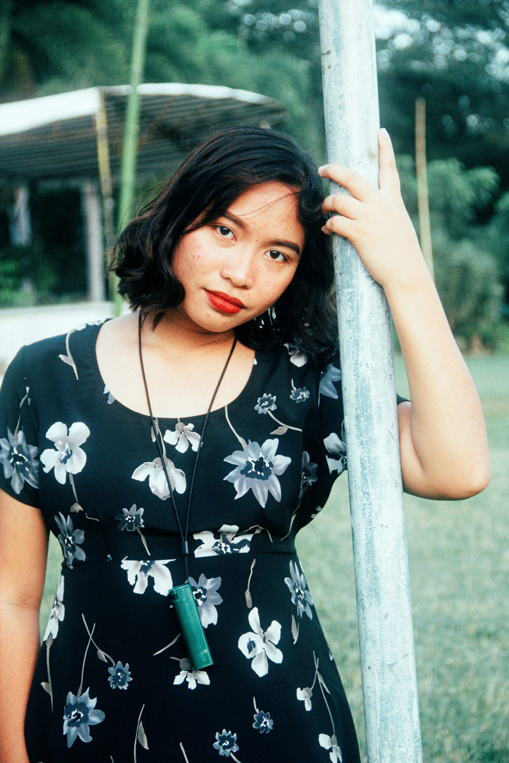 an asian woman posing for the camera