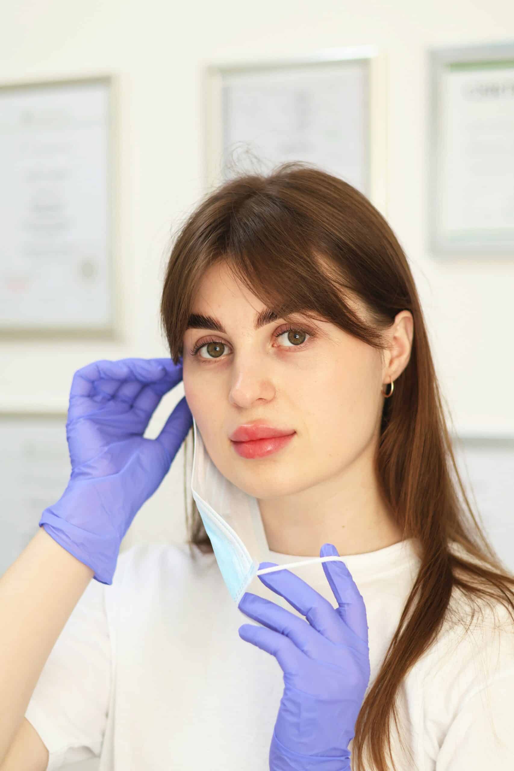 a doctor putting her mask on