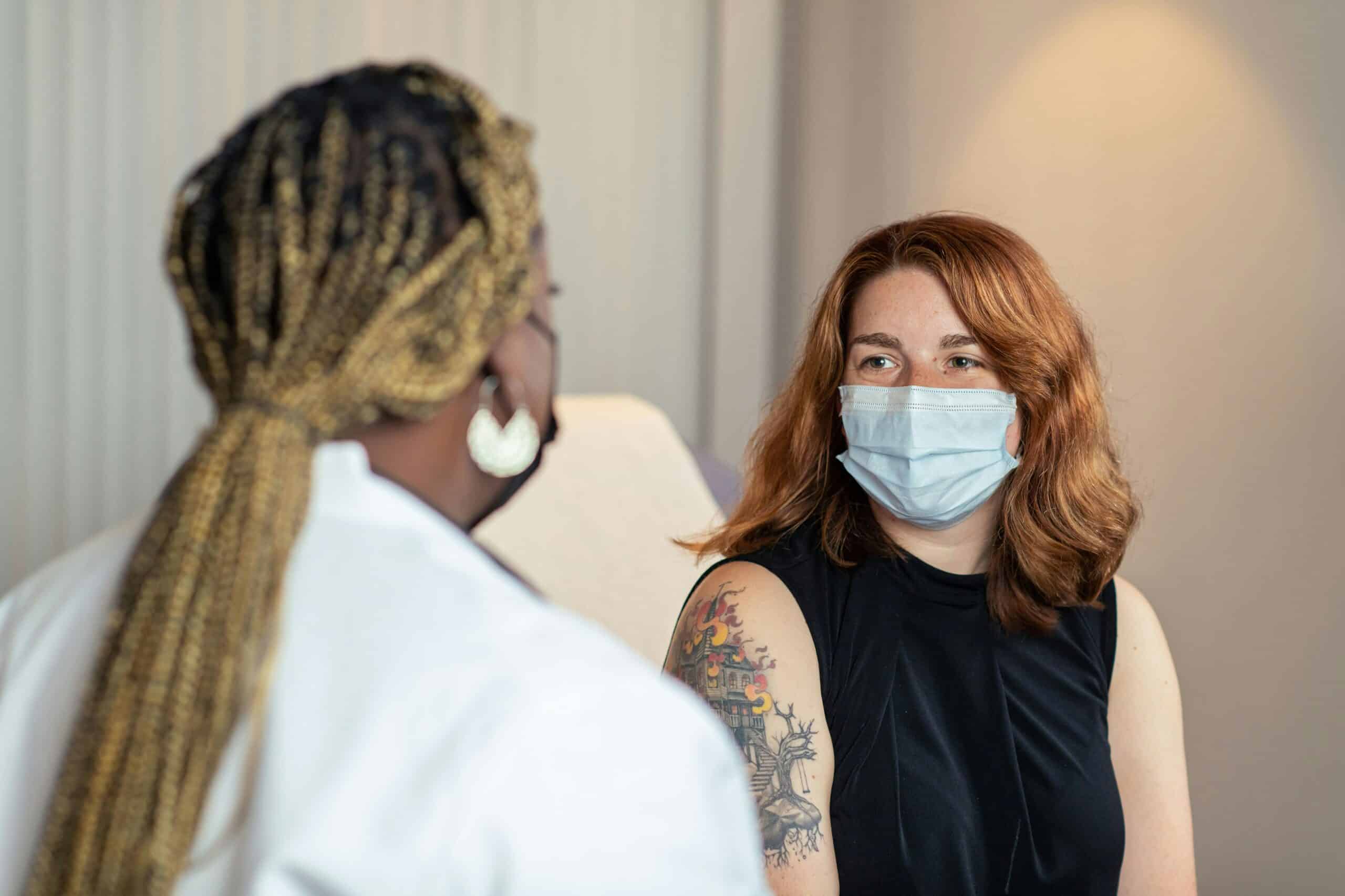 a dcotor and a patient having a discussion