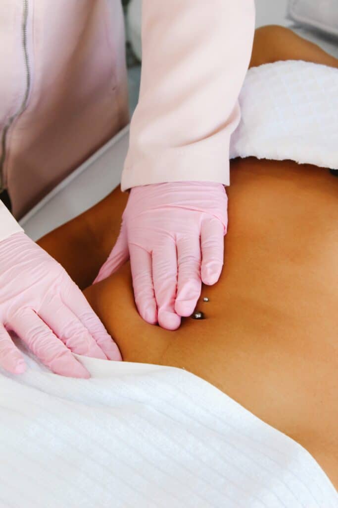 massage therapy on a woman's pelvic