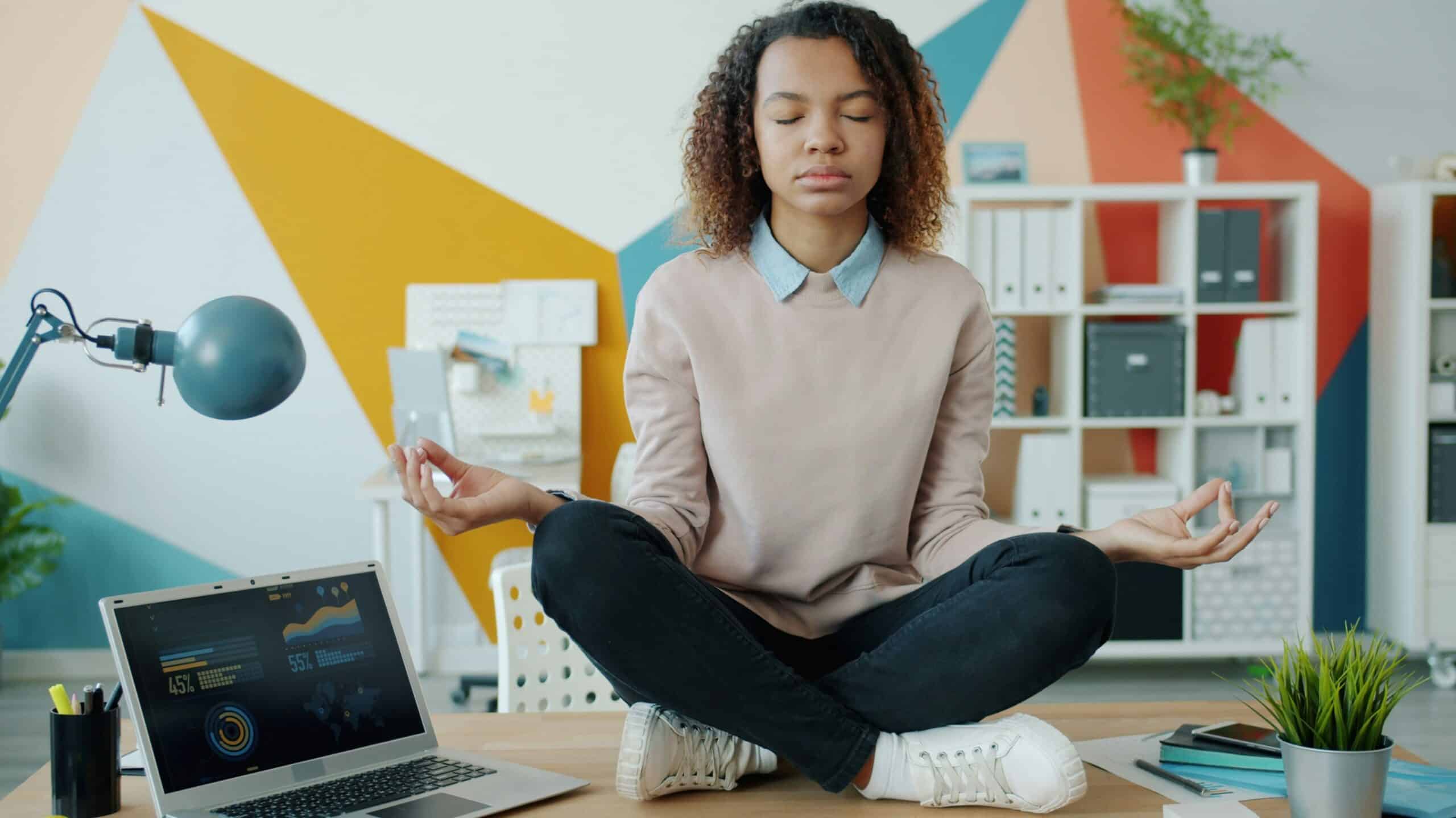 Woman performing a yoga pose, illustrating how physical therapy supports emotional well-being and chronic pain management.