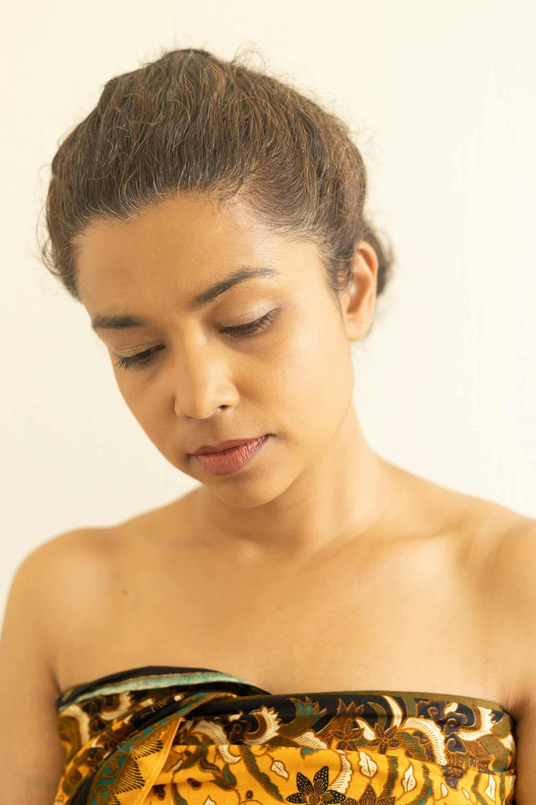 a woman with neutral face expressions