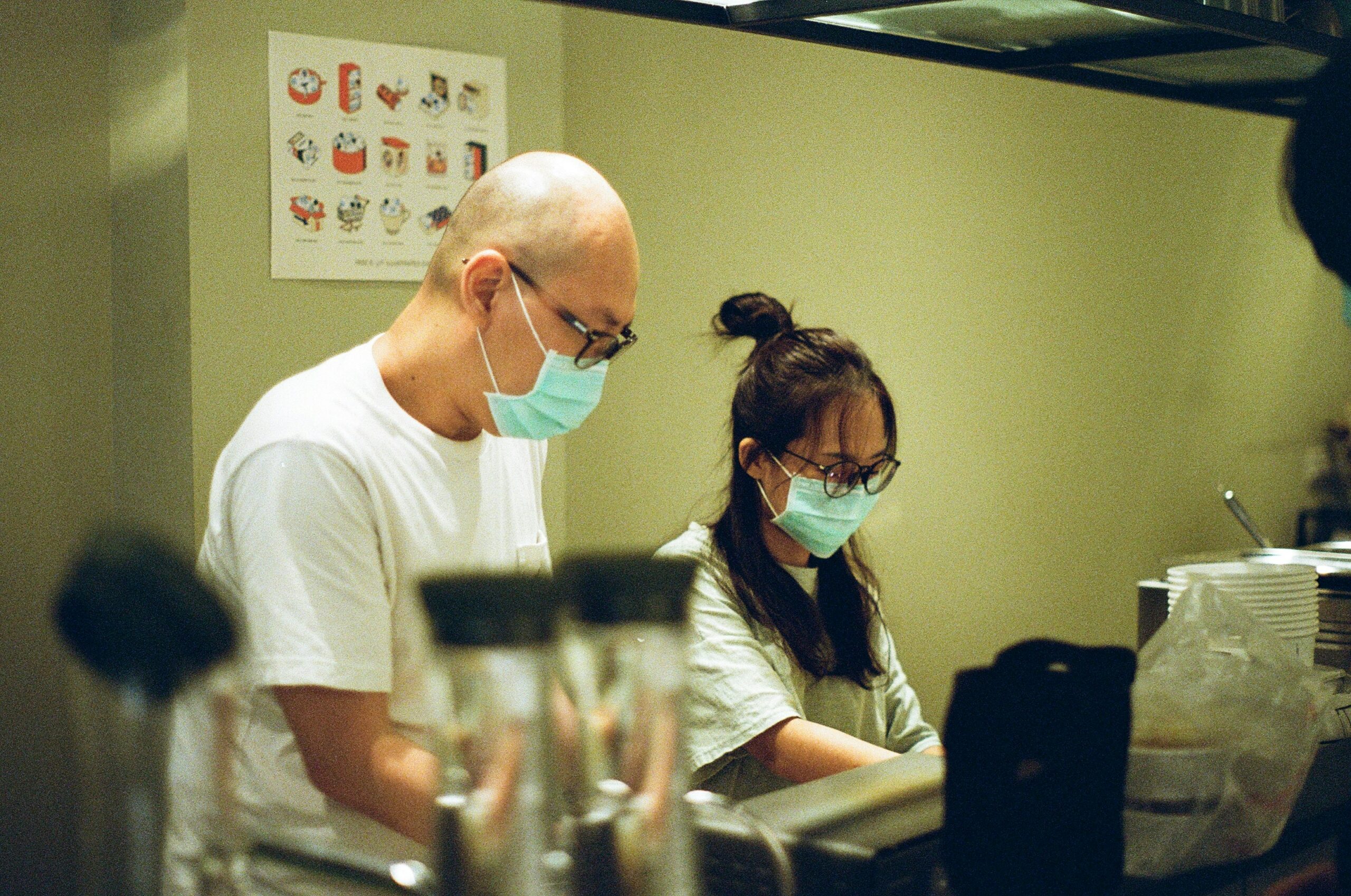 laboratory workers running tests