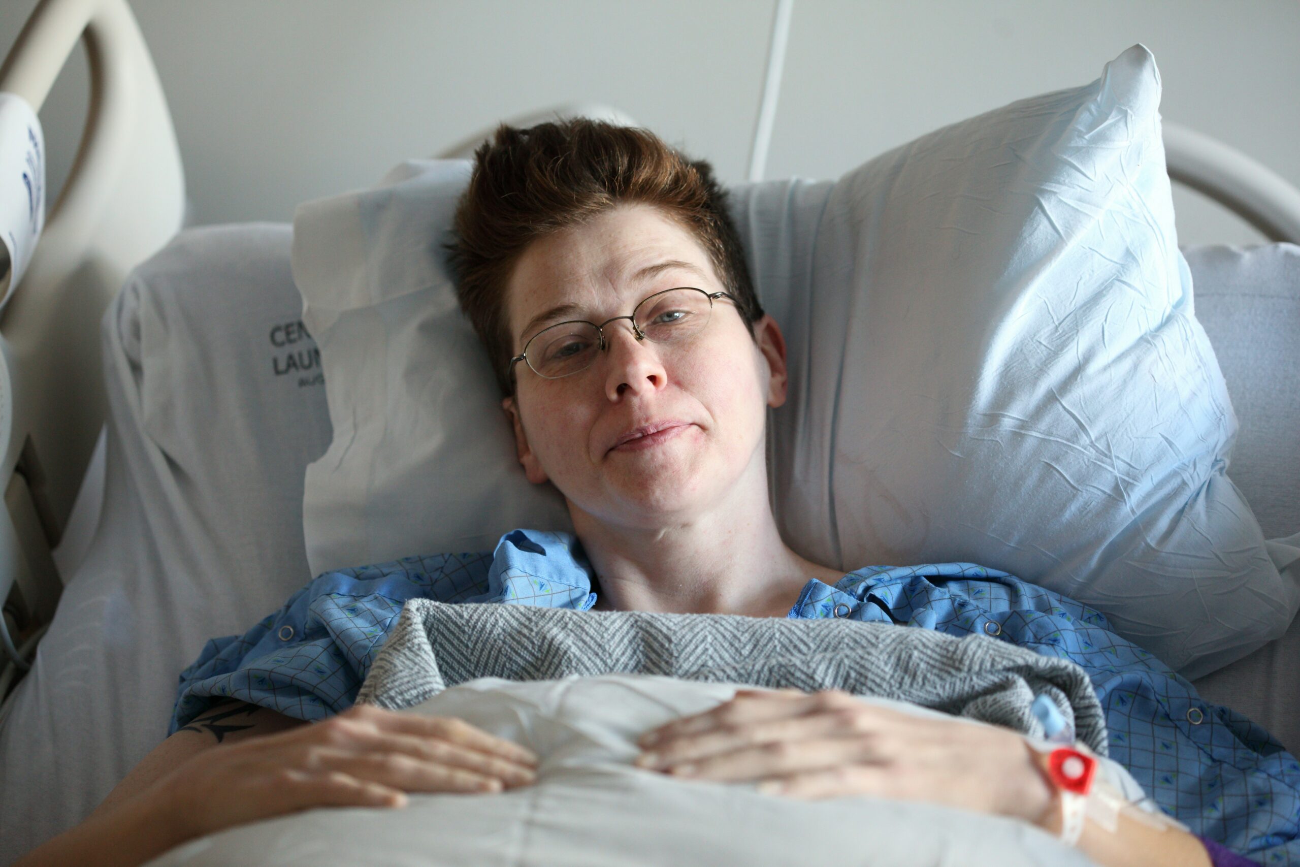 woman in recovery room