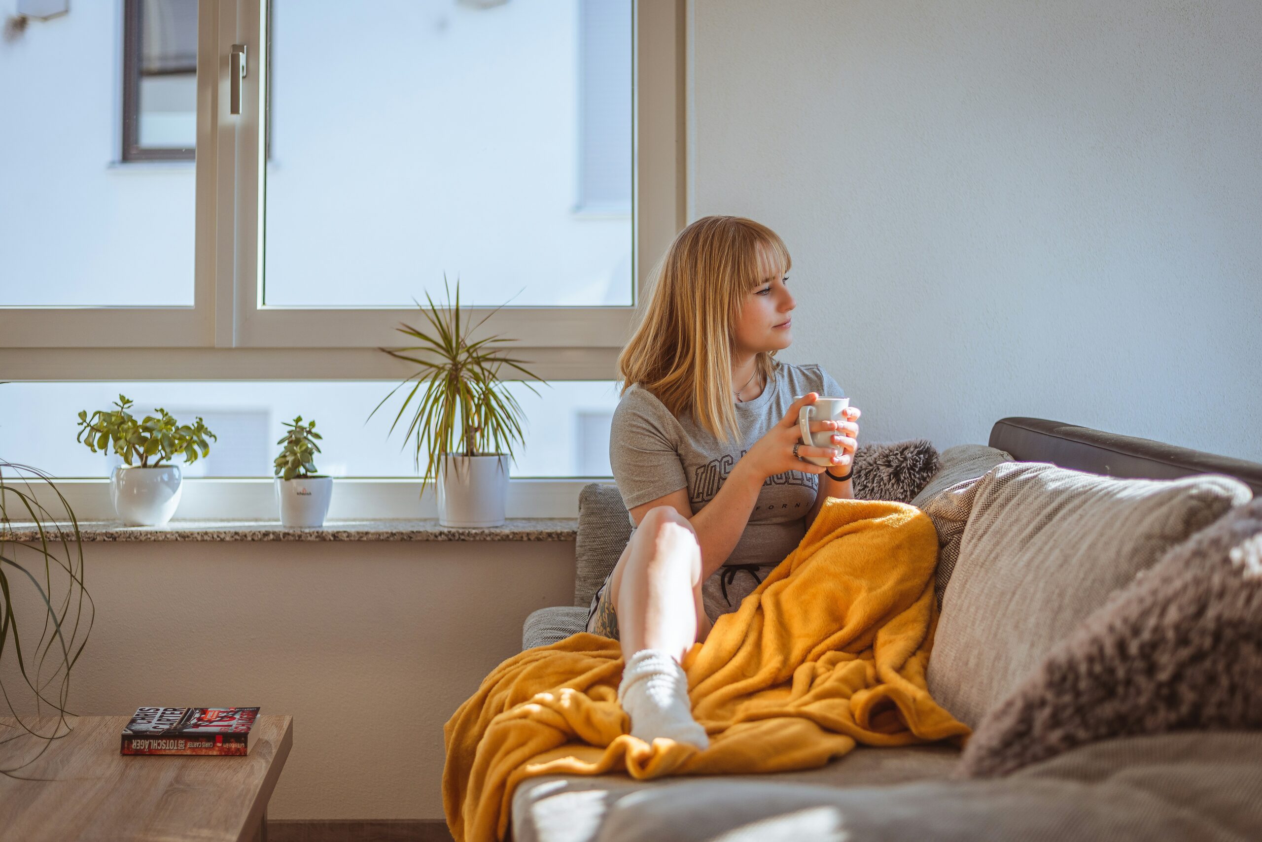 woman sitting on couch - Rachael Haverland Site woman sitting on couch
