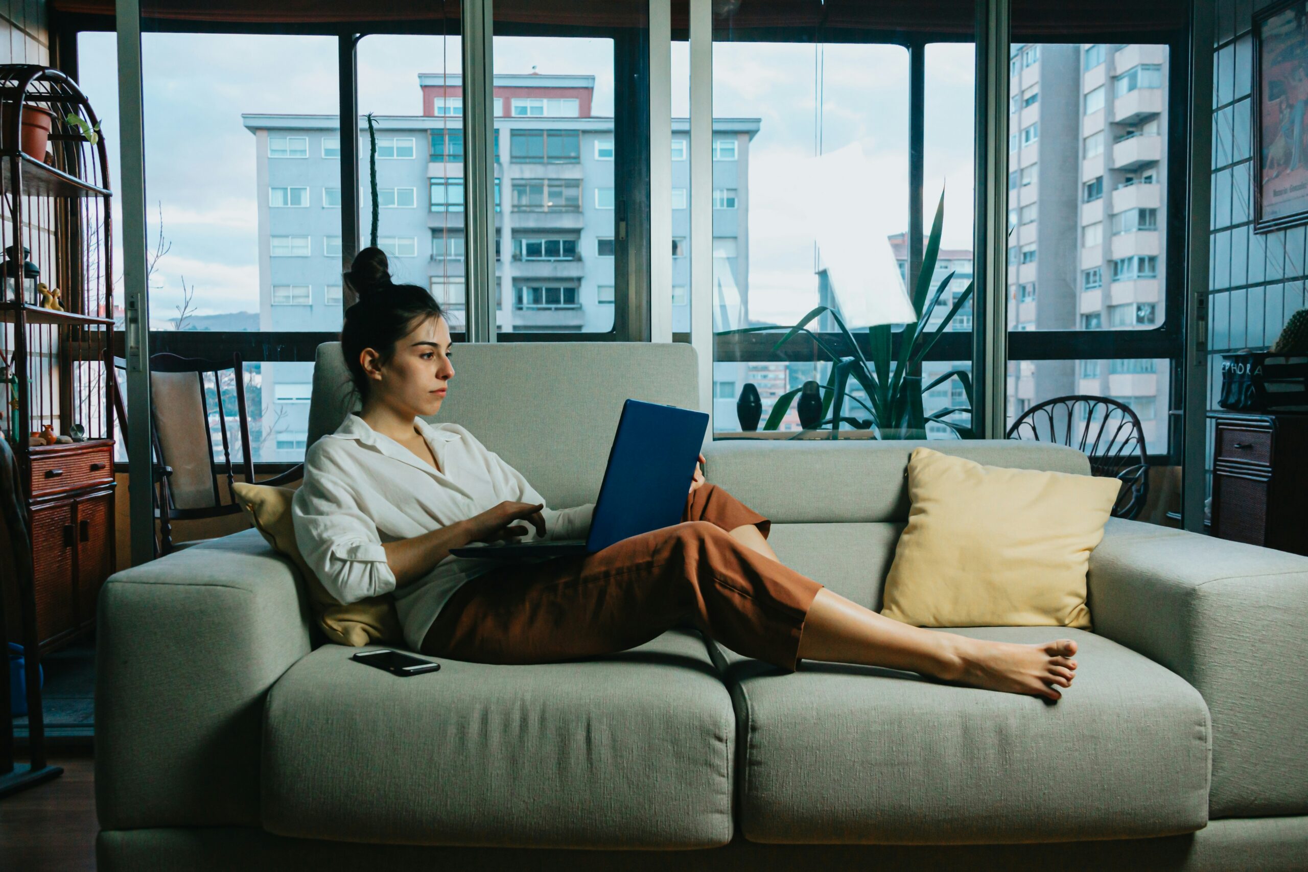 A woman resting on the sofa