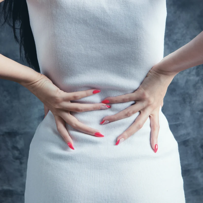 Woman experiencing chronic pelvic pain from complex endometriosis