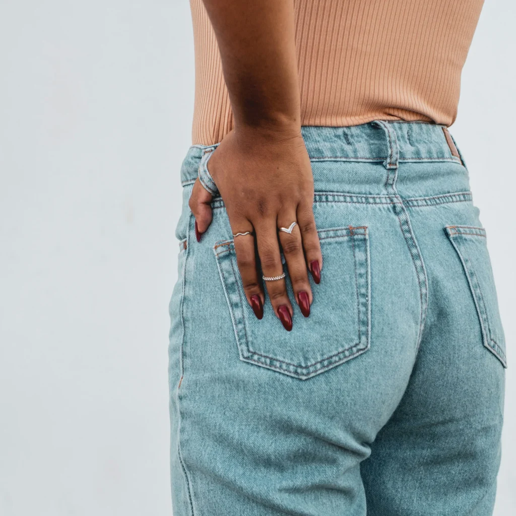 Woman holding her hip due to endometriosis-related pain