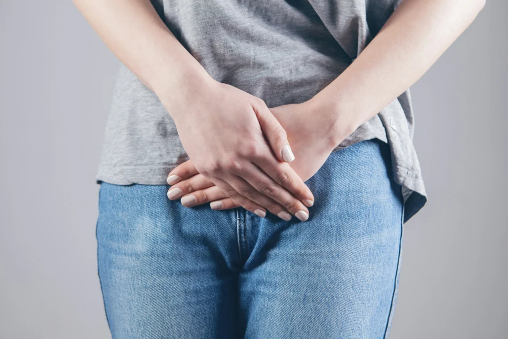 Woman experiencing painful urination caused by bladder endometriosis