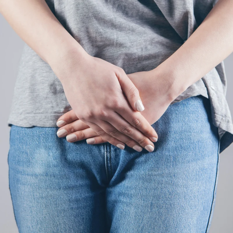 Woman experiencing painful urination caused by bladder endometriosis