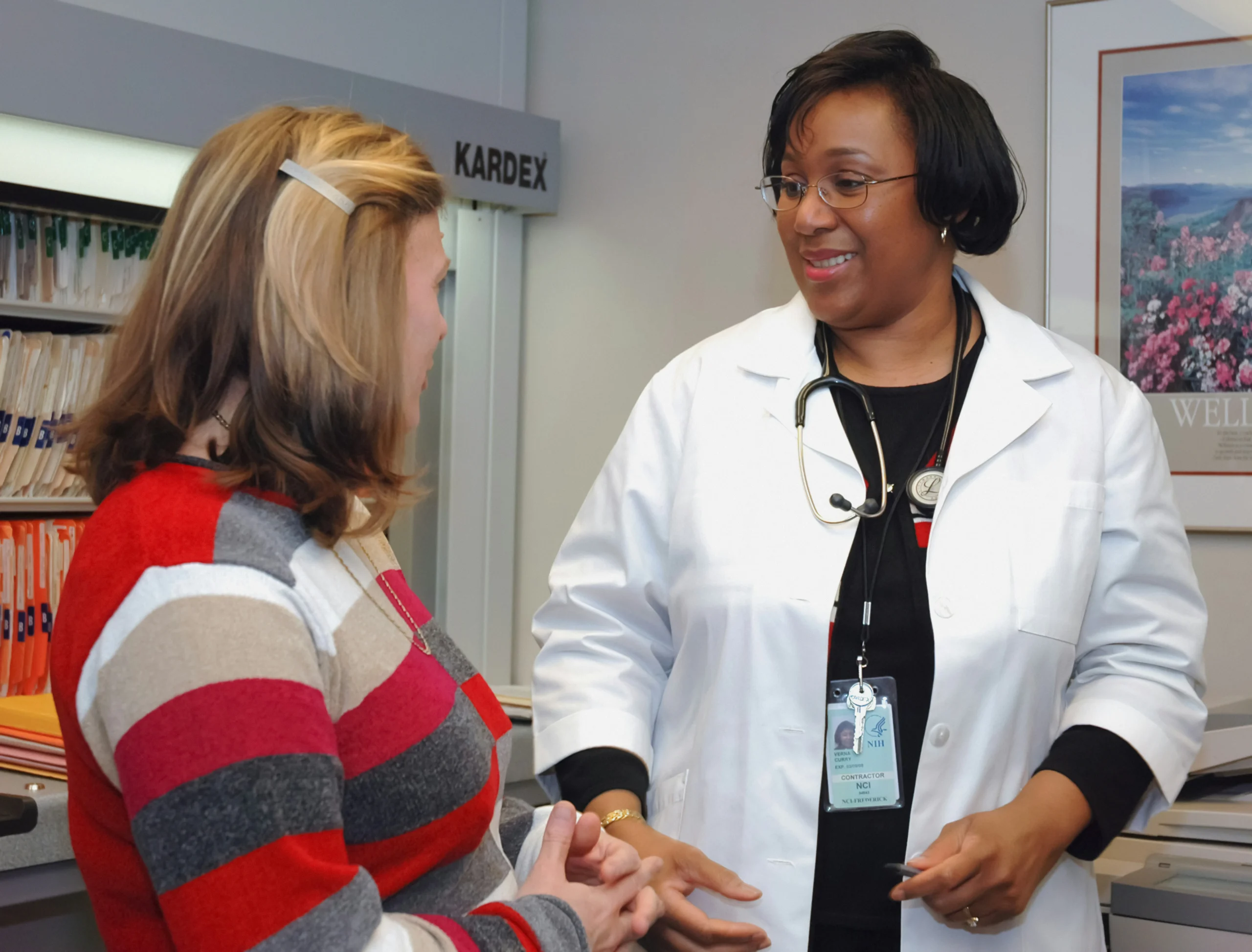 Doctor explaining bowel endometriosis symptoms to a patient
